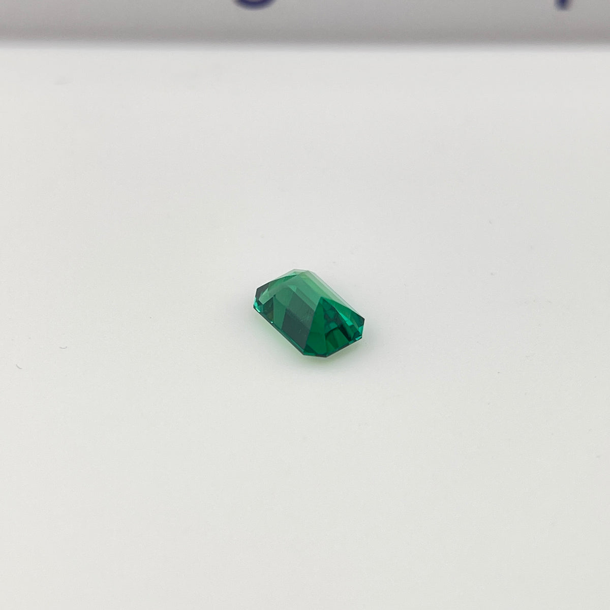 Zambia Green Hydrothermal Emerald [Beryl] | Emerald Cut | 4x6 mm | Gemdrop® Verified