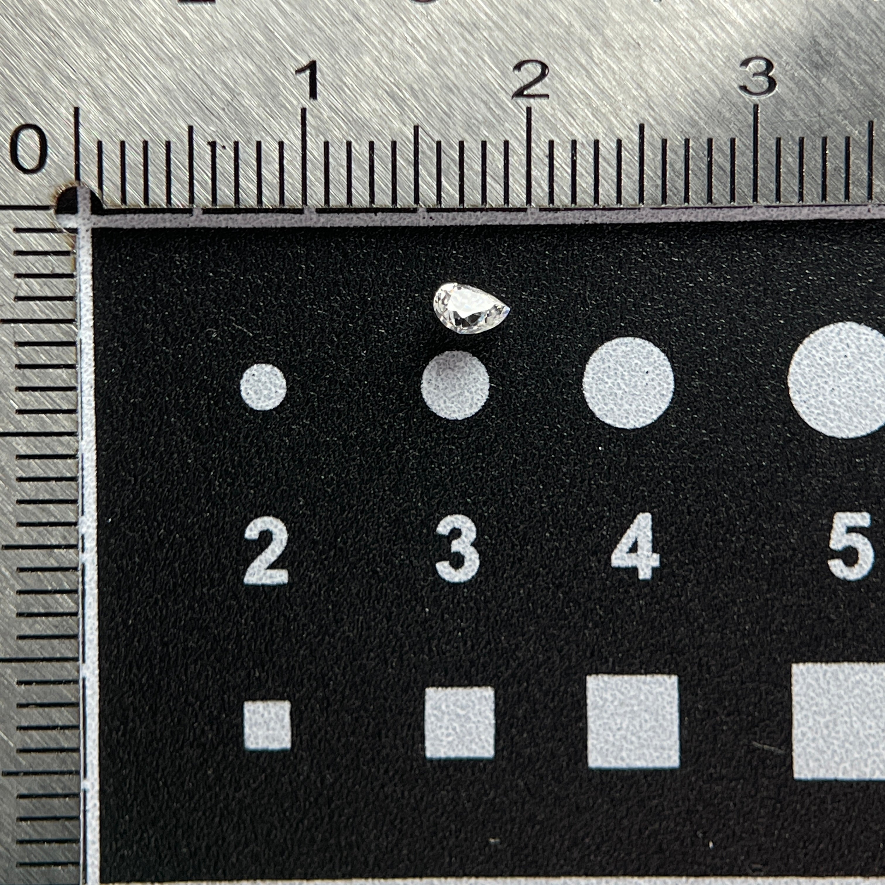 2.5 x 3.5 mm D VVS1 Space Diamond™ Moissanite | Drop Pear Cut | Gemdrop® Verified