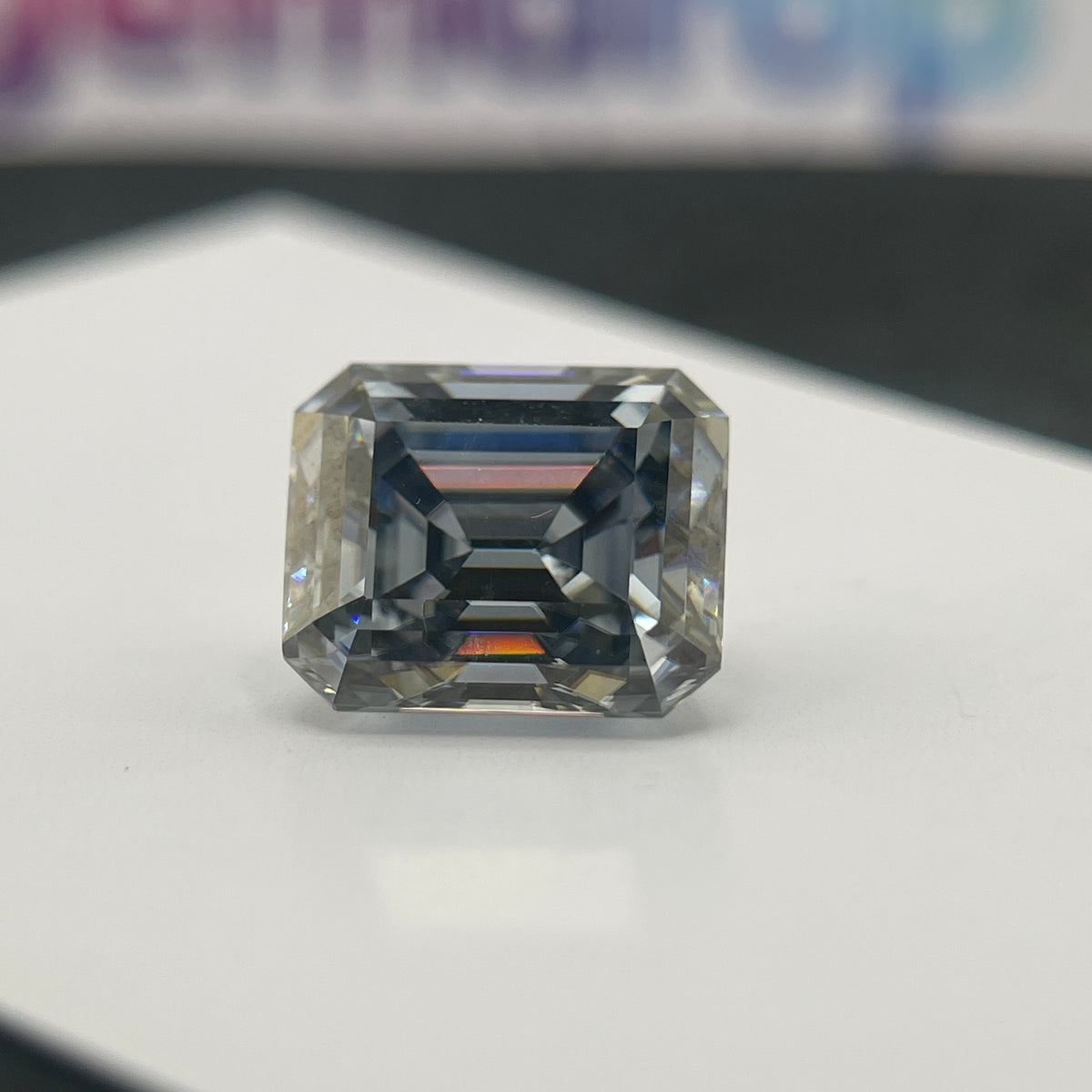 11 Carat Emerald Cut VVS1 Hebridean Grey Moissanite Space Diamond | 12 x 14 mm | Gemdrop® Verified