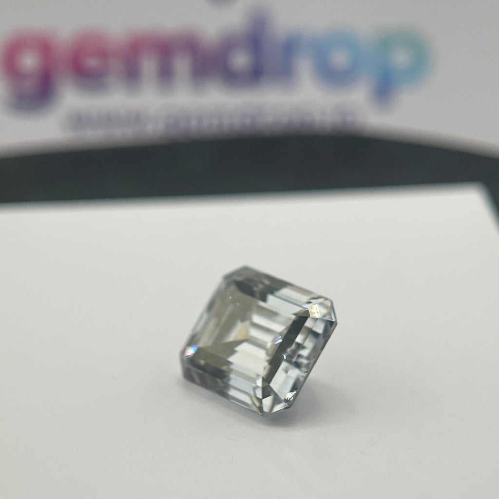 11 Carat Emerald Cut VVS1 Hebridean Grey Moissanite Space Diamond | 12 x 14 mm | Gemdrop® Verified