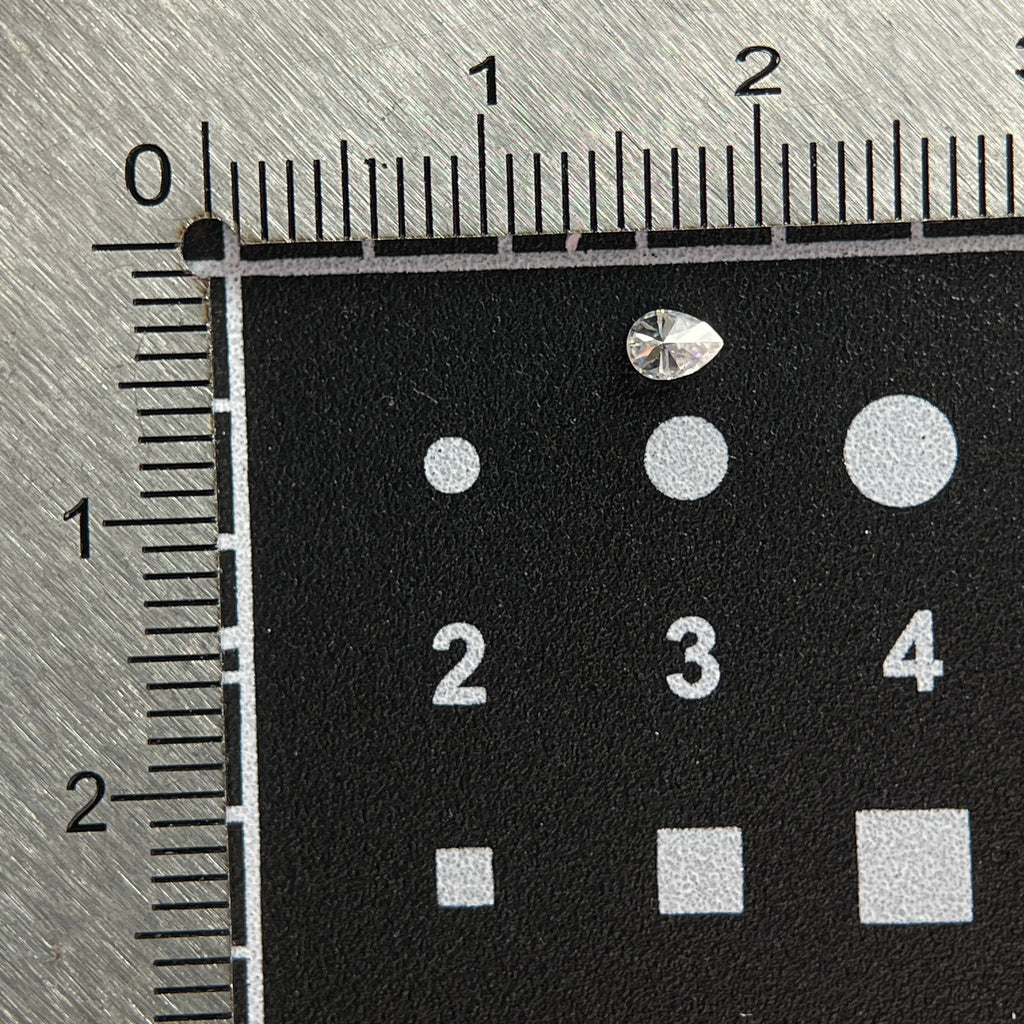 2.5 x 3.5 mm D VVS1 Space Diamond™ Moissanite | Drop Pear Cut | Gemdrop® Verified