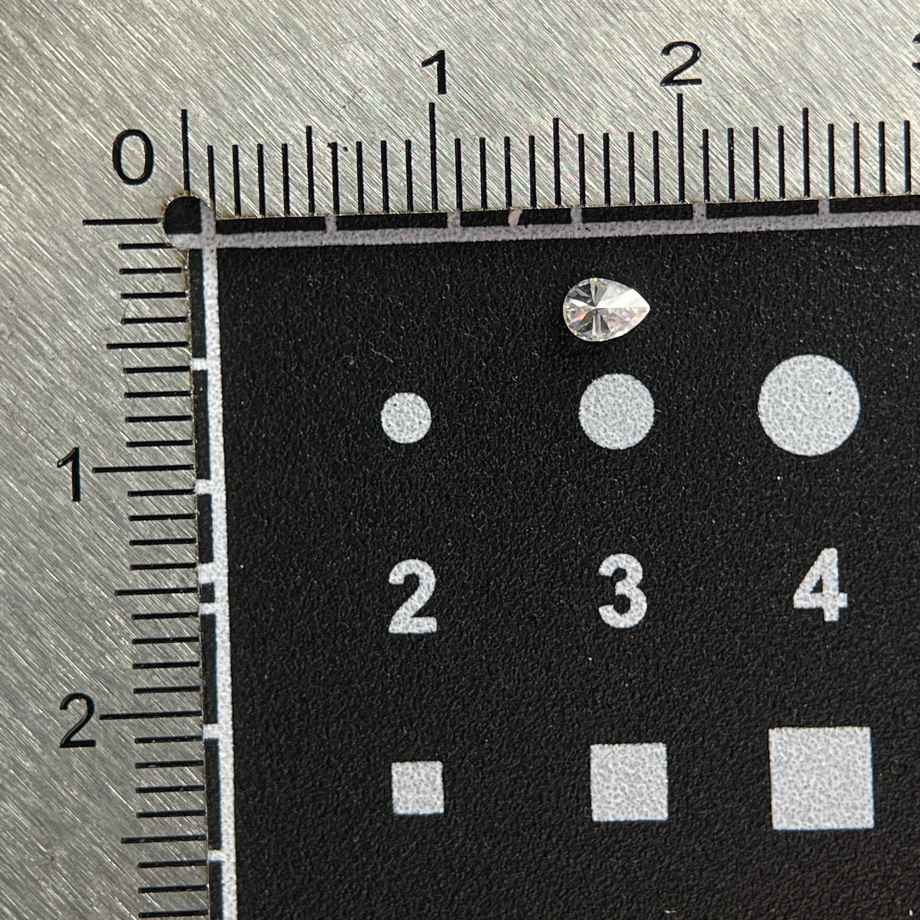 2.5 x 3.5 mm D VVS1 Space Diamond™ Moissanite | Drop Pear Cut | Gemdrop® Verified