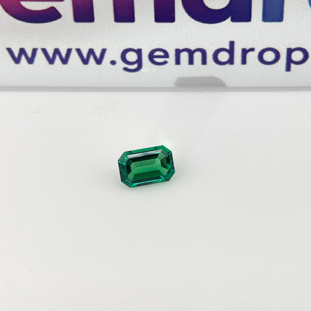 Zambia Green Hydrothermal Emerald [Beryl] | Emerald Cut | 4x6 mm | Gemdrop® Verified