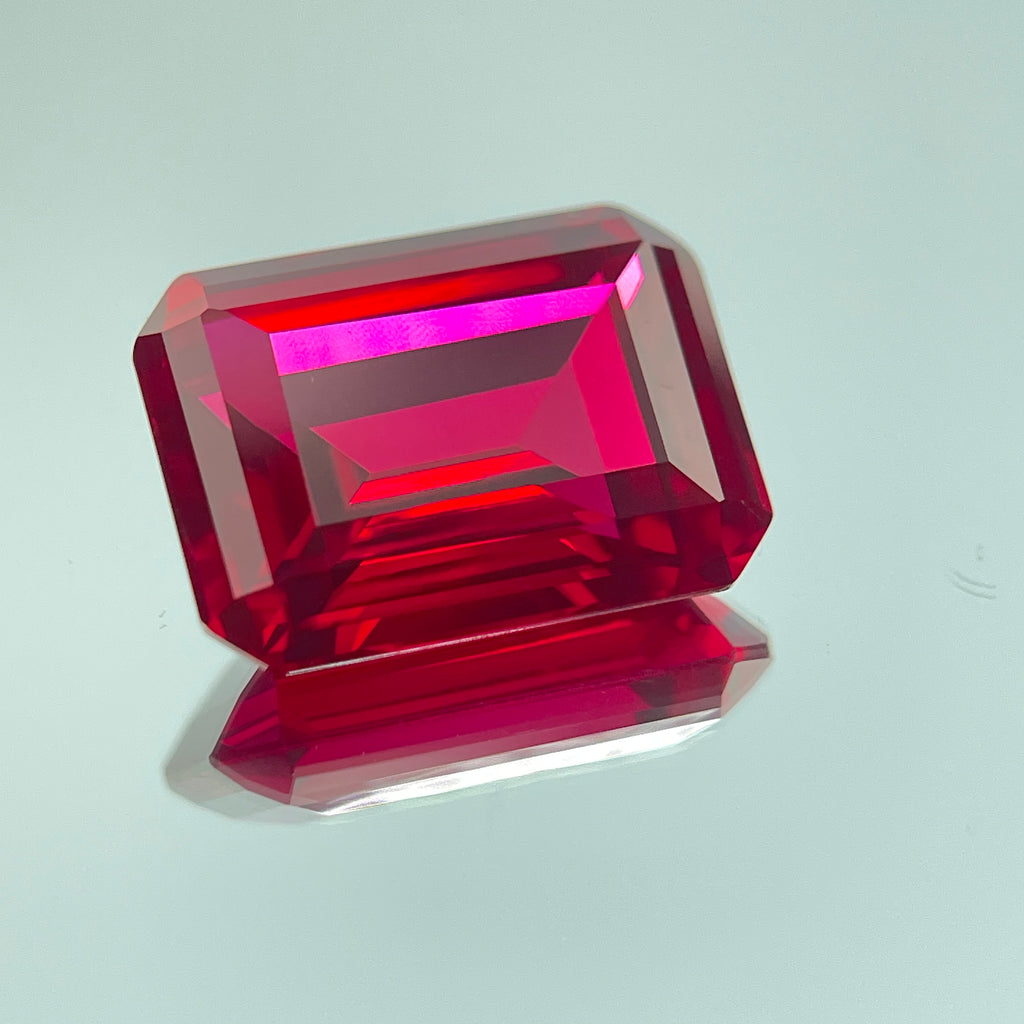 ~30ct Pigeon Blood Ruby | Emerald Cut | 1.5 × 2 cm | Gemdrop® Verified