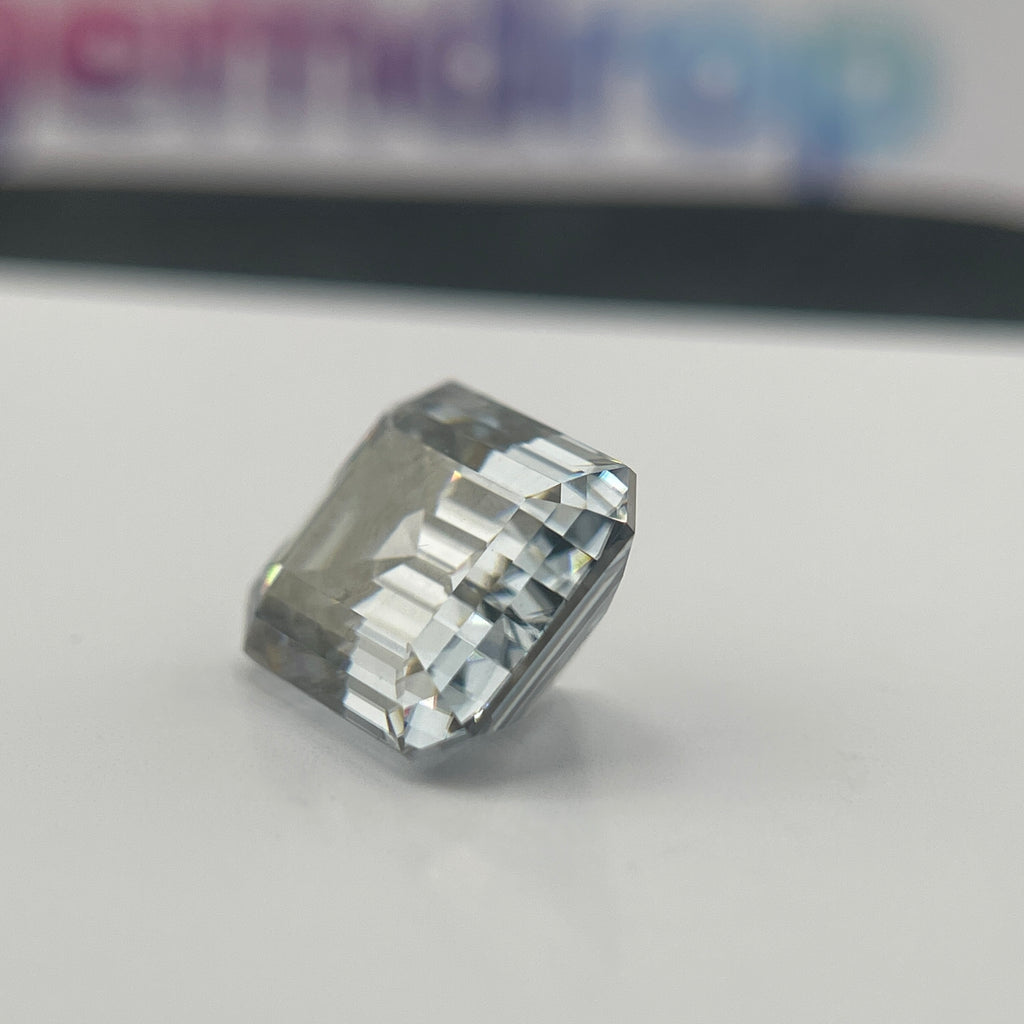 11 Carat Emerald Cut VVS1 Hebridean Grey Moissanite Space Diamond | 12 x 14 mm | Gemdrop® Verified