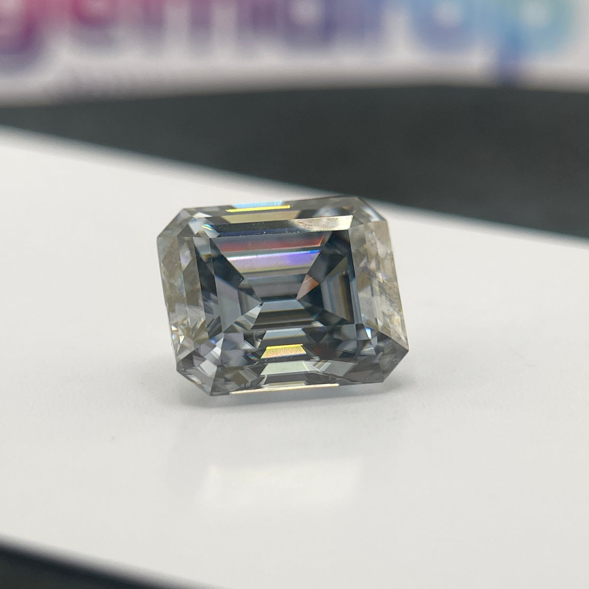11 Carat Emerald Cut VVS1 Hebridean Grey Moissanite Space Diamond | 12 x 14 mm | Gemdrop® Verified