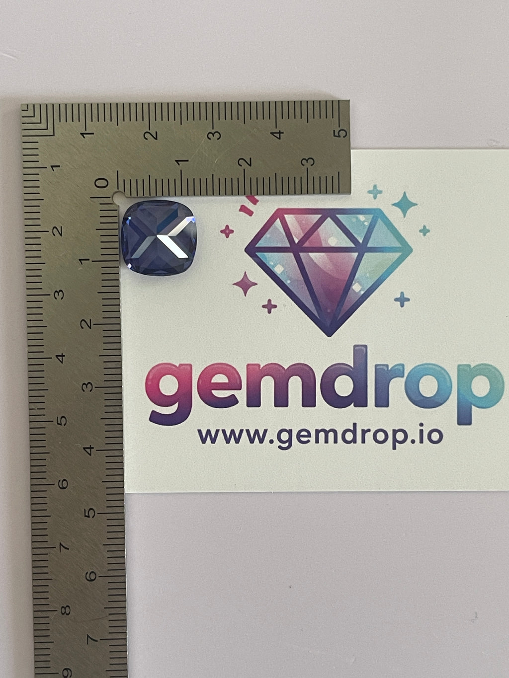 ~12 ct Saphir bleu tanzanite | Taille coussin | 12 × 12 mm | Vérifié Gemdrop®