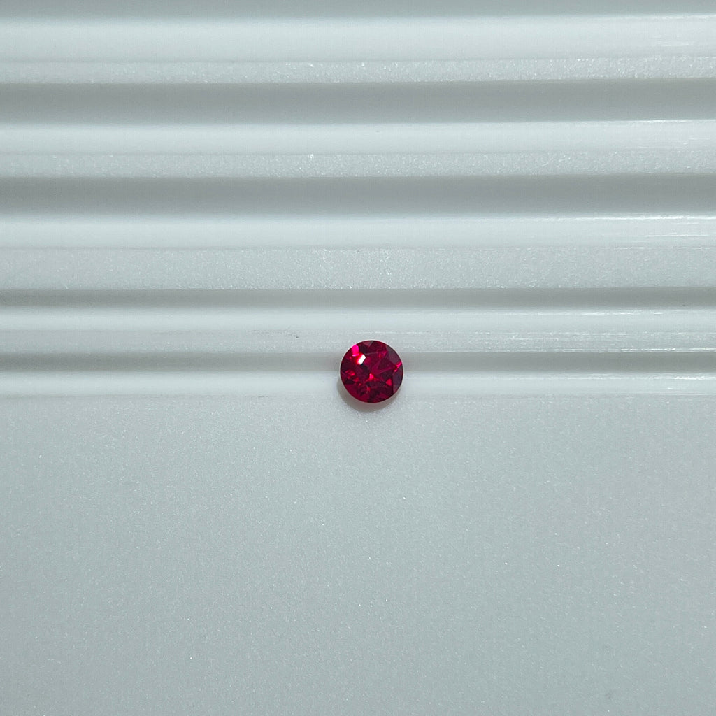 ~0.1ct Pigeon Blood Red Czochralski Ruby | Round Brilliant Cut | 3 mm | Gemdrop® Verified