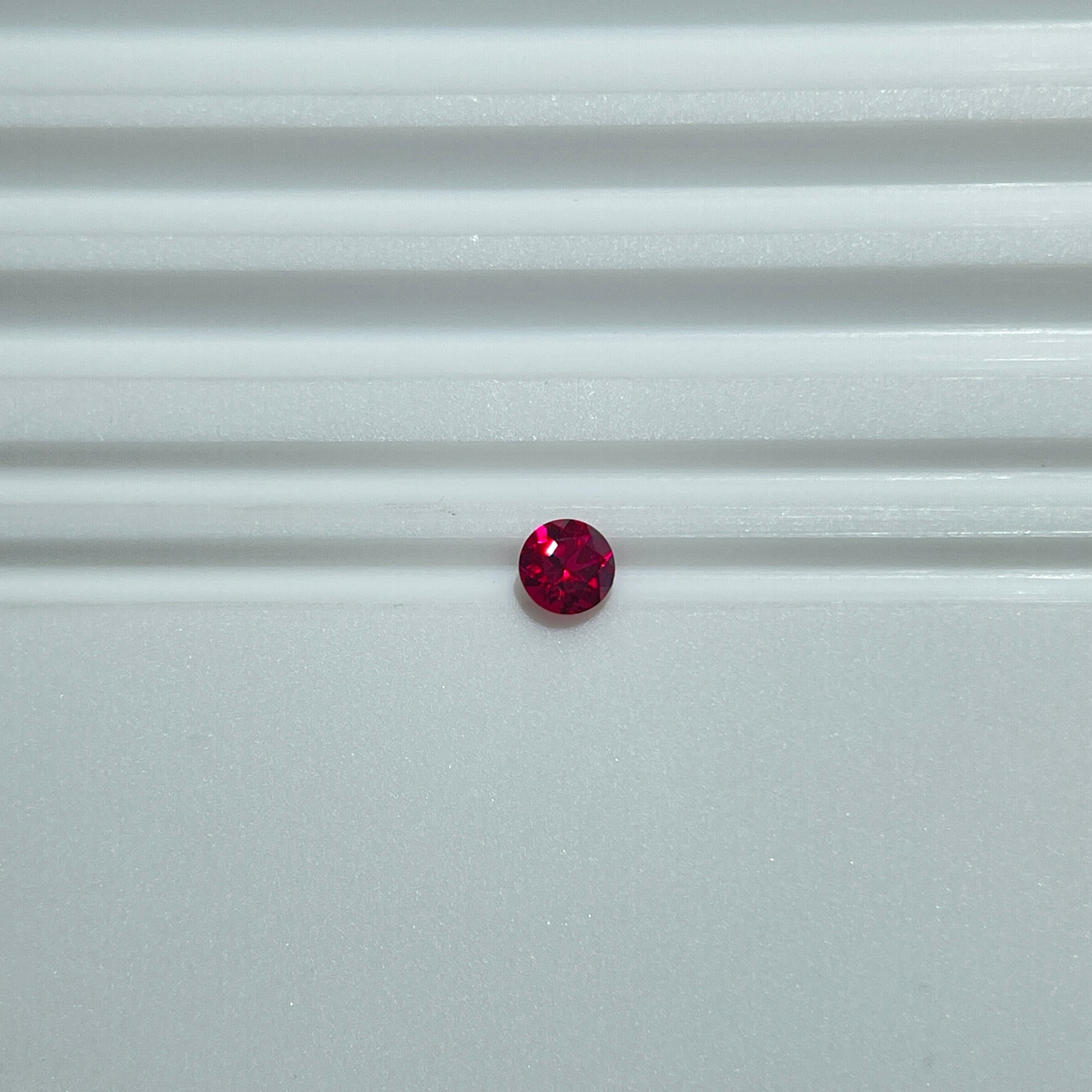 ~0.1ct Pigeon Blood Red Czochralski Ruby | Round Brilliant Cut | 3 mm | Gemdrop® Verified