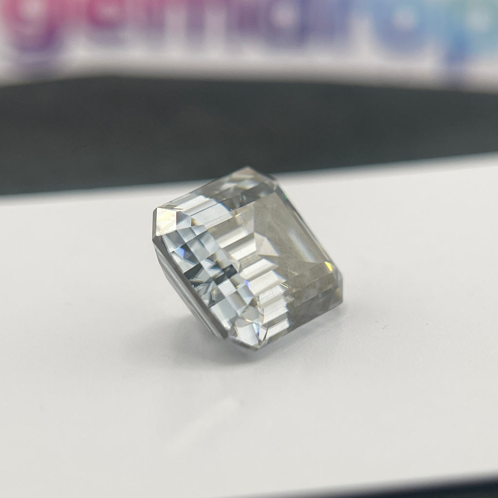 11 Carat Emerald Cut VVS1 Hebridean Grey Moissanite Space Diamond | 12 x 14 mm | Gemdrop® Verified
