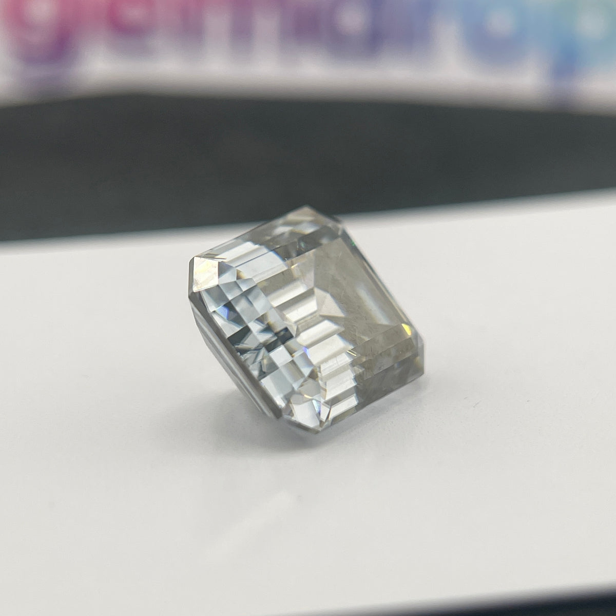 11 Carat Emerald Cut VVS1 Hebridean Grey Moissanite Space Diamond | 12 x 14 mm | Gemdrop® Verified