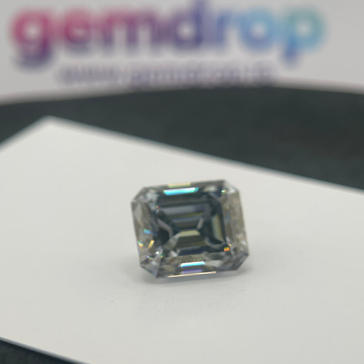 11 Carat Emerald Cut VVS1 Hebridean Grey Moissanite Space Diamond | 12 x 14 mm | Gemdrop® Verified