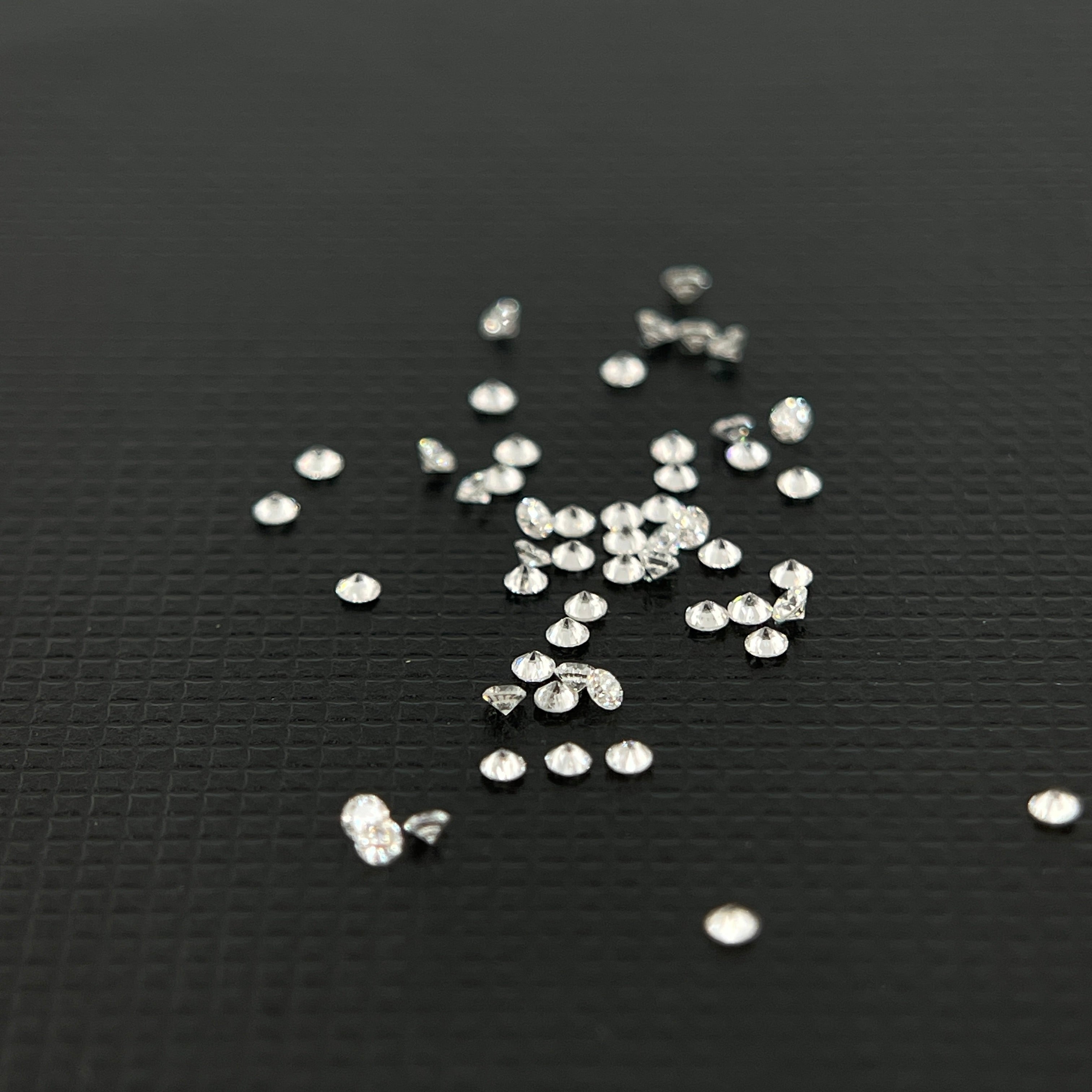 1.5 mm Round Brilliant HPHT Lab-Grown Diamond | ~0.01ct | DEF Colour | VVS Clarity | GemDrop® Verified