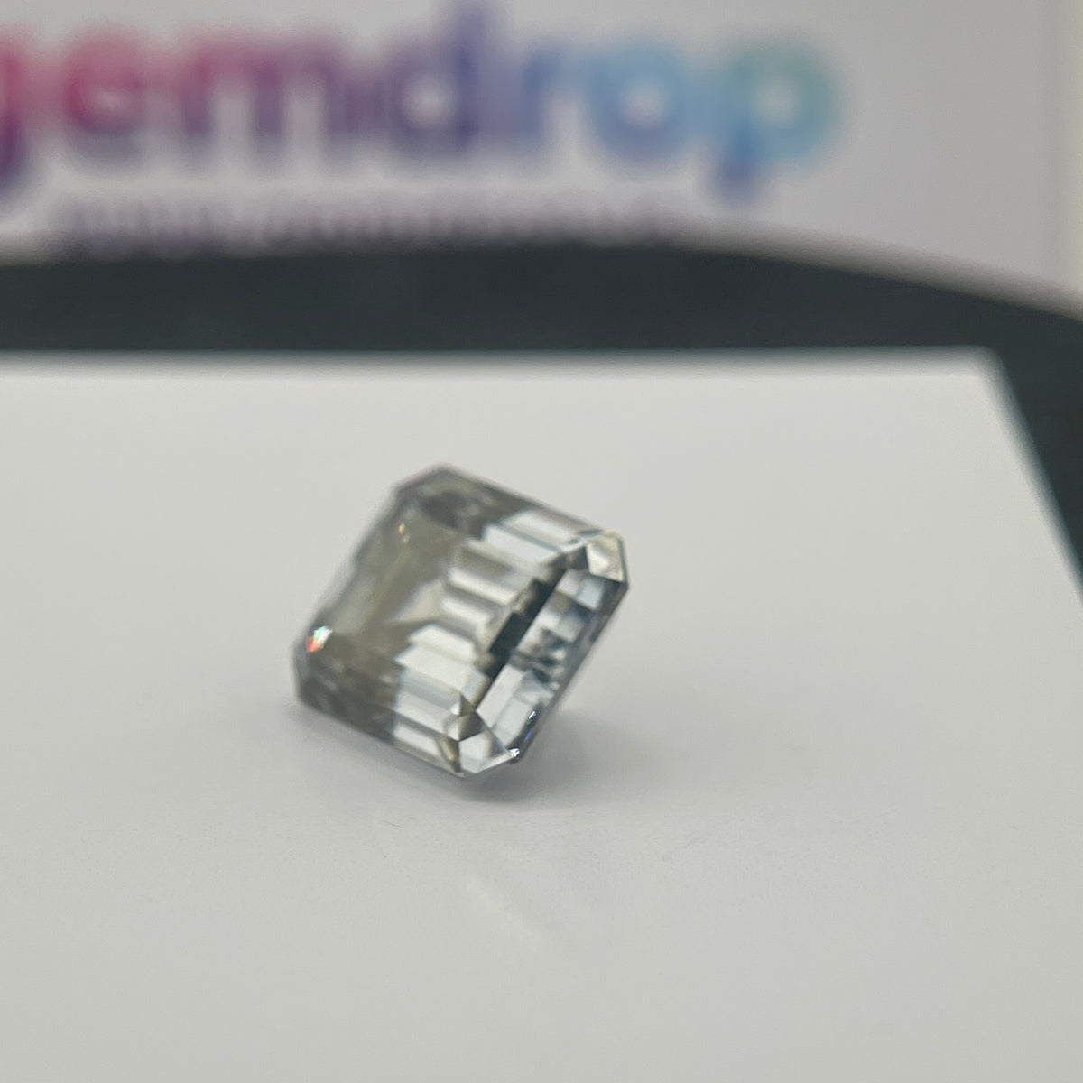 11 Carat Emerald Cut VVS1 Hebridean Grey Moissanite Space Diamond | 12 x 14 mm | Gemdrop® Verified