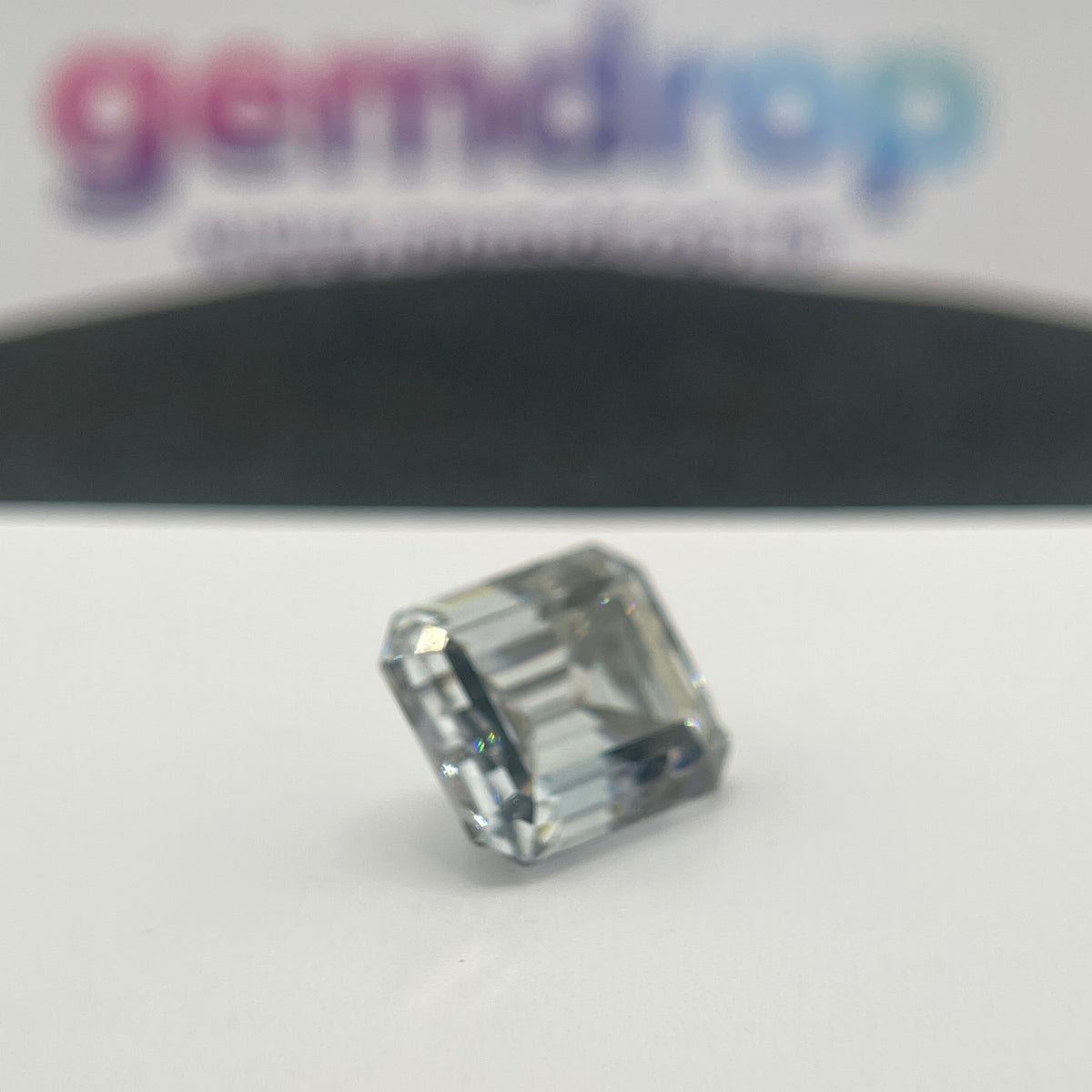 11 Carat Emerald Cut VVS1 Hebridean Grey Moissanite Space Diamond | 12 x 14 mm | Gemdrop® Verified