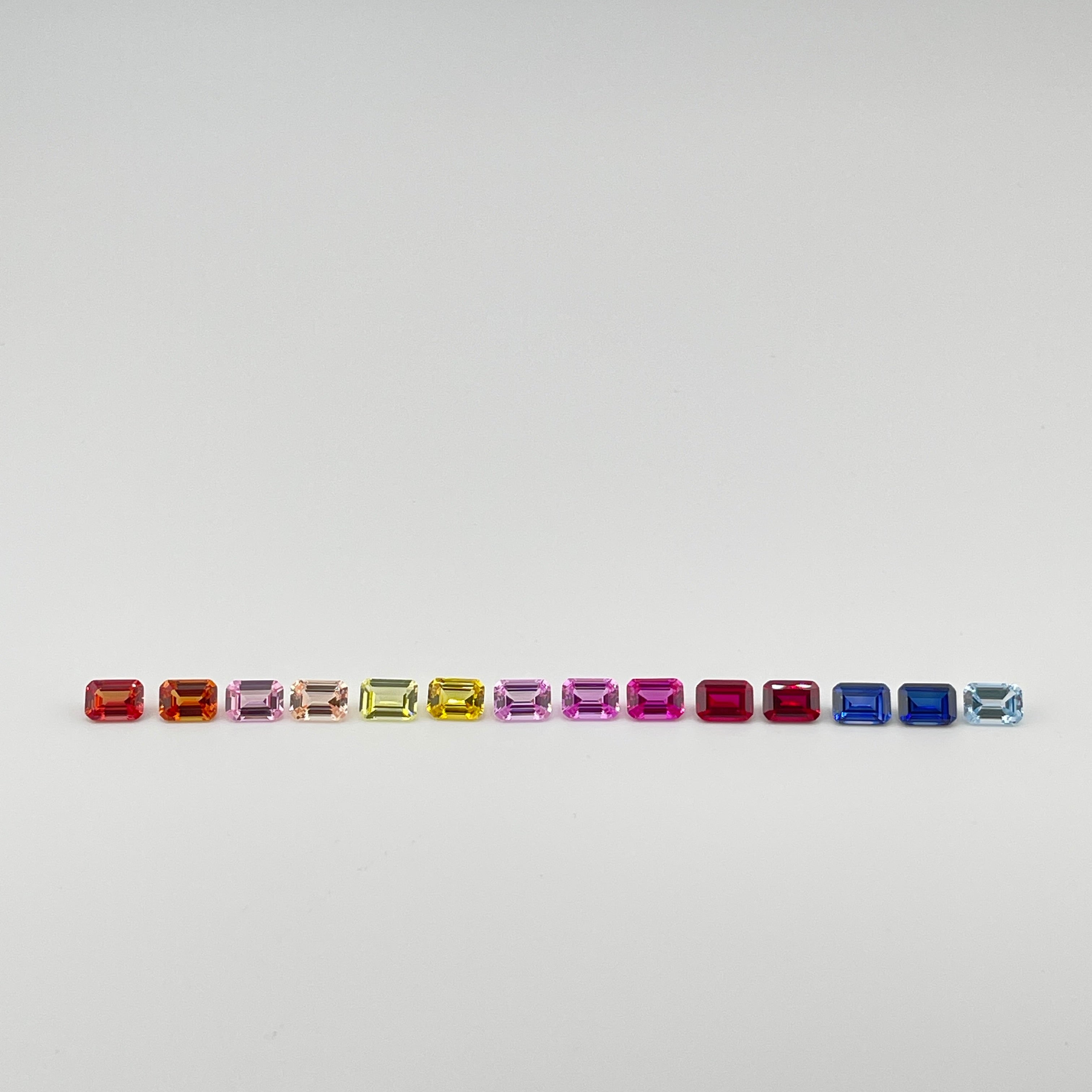 ~1ct Emerald Cut 5x7 mm | Multicolour | Gemdrop® Verified