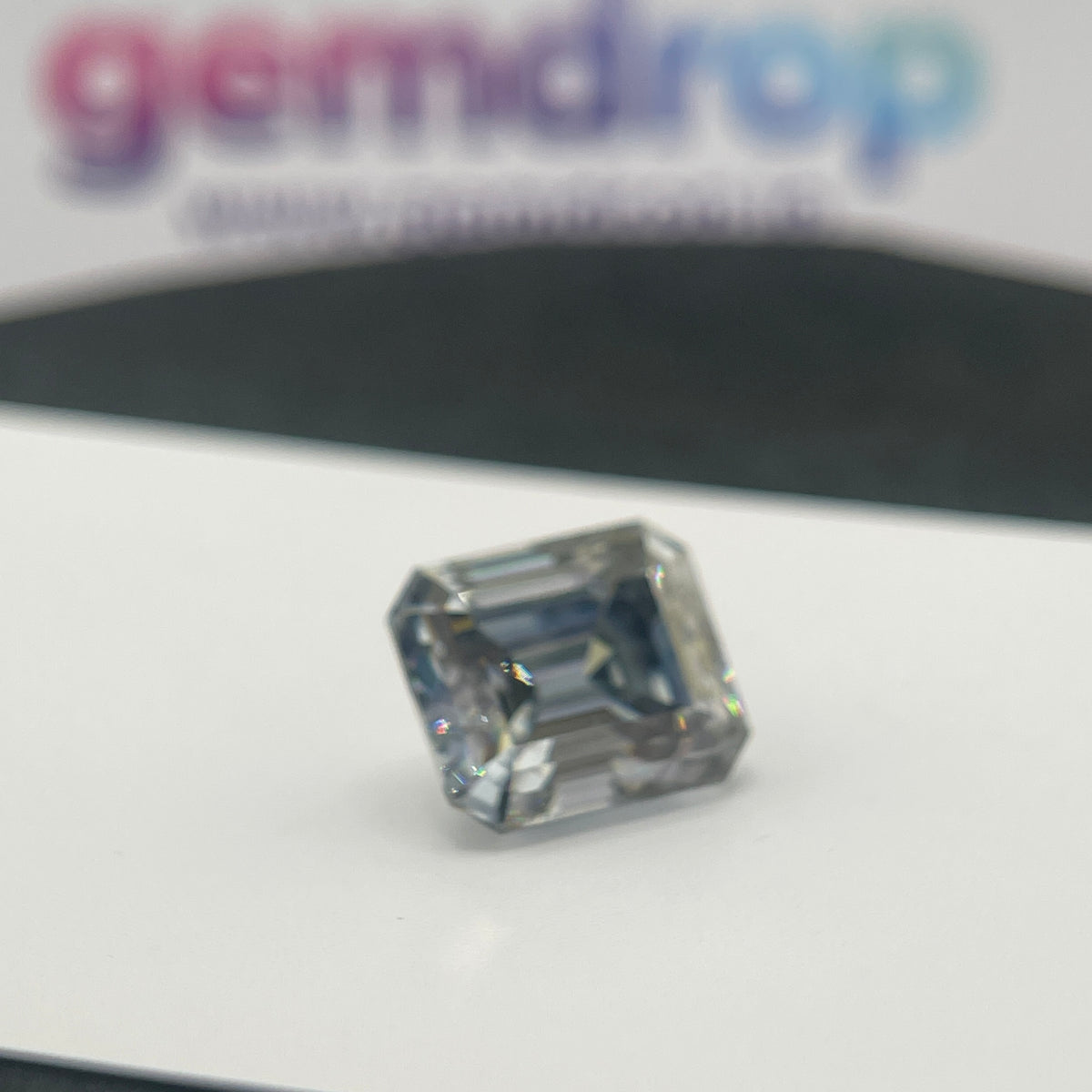 11 Carat Emerald Cut VVS1 Hebridean Grey Moissanite Space Diamond | 12 x 14 mm | Gemdrop® Verified
