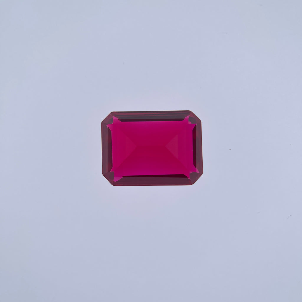 ~30ct Pigeon Blood Ruby | Emerald Cut | 1.5 × 2 cm | Gemdrop® Verified