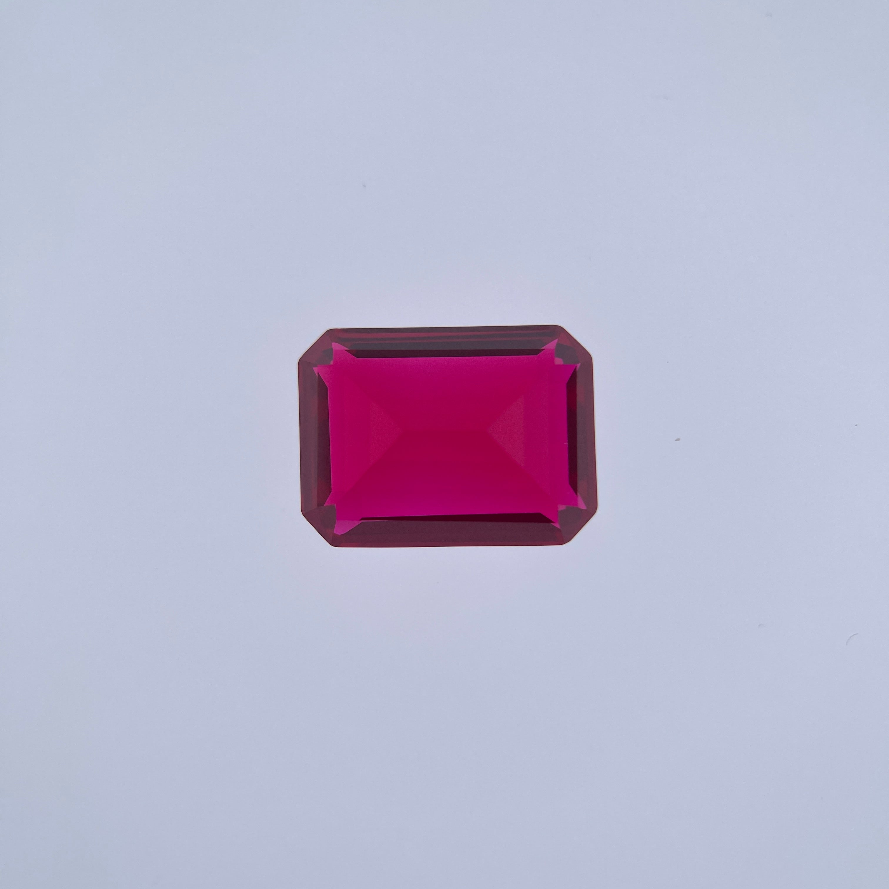 ~30ct Pigeon Blood Ruby | Emerald Cut | 1.5 × 2 cm | Gemdrop® Verified