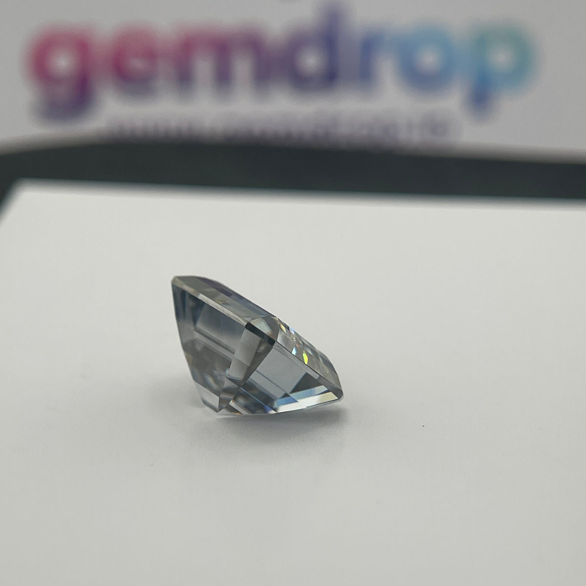 11 Carat Emerald Cut VVS1 Hebridean Grey Moissanite Space Diamond | 12 x 14 mm | Gemdrop® Verified