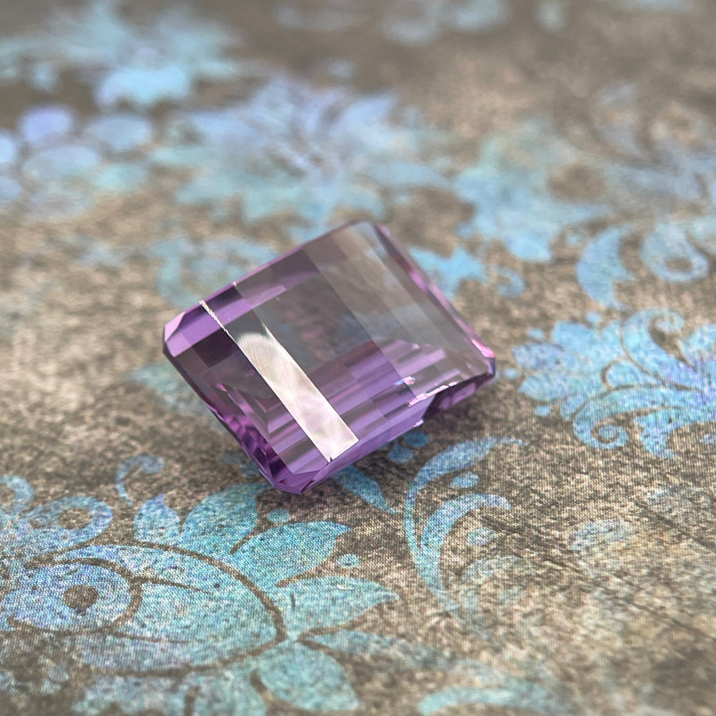 20.175ct Purple–Green Colour Change Corundum Alexandrite | Pixel Cut | 13x18 mm | Gemdrop® Verified
