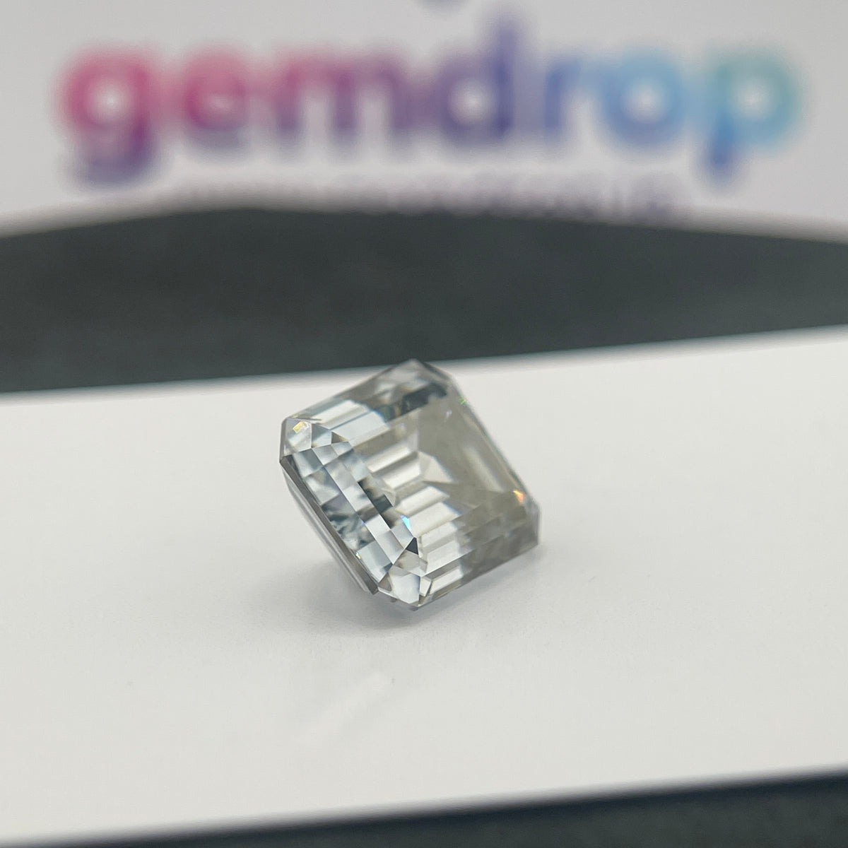 11 Carat Emerald Cut VVS1 Hebridean Grey Moissanite Space Diamond | 12 x 14 mm | Gemdrop® Verified