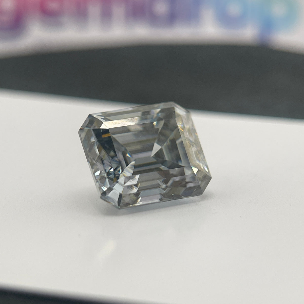 11 Carat Emerald Cut VVS1 Hebridean Grey Moissanite Space Diamond | 12 x 14 mm | Gemdrop® Verified