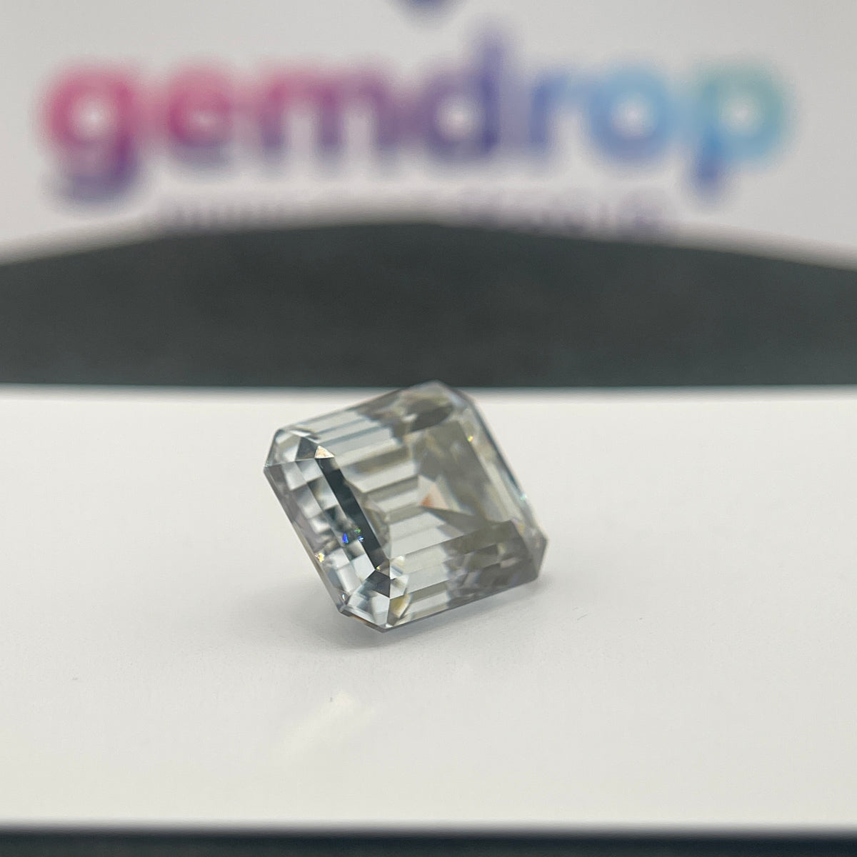 11 Carat Emerald Cut VVS1 Hebridean Grey Moissanite Space Diamond | 12 x 14 mm | Gemdrop® Verified