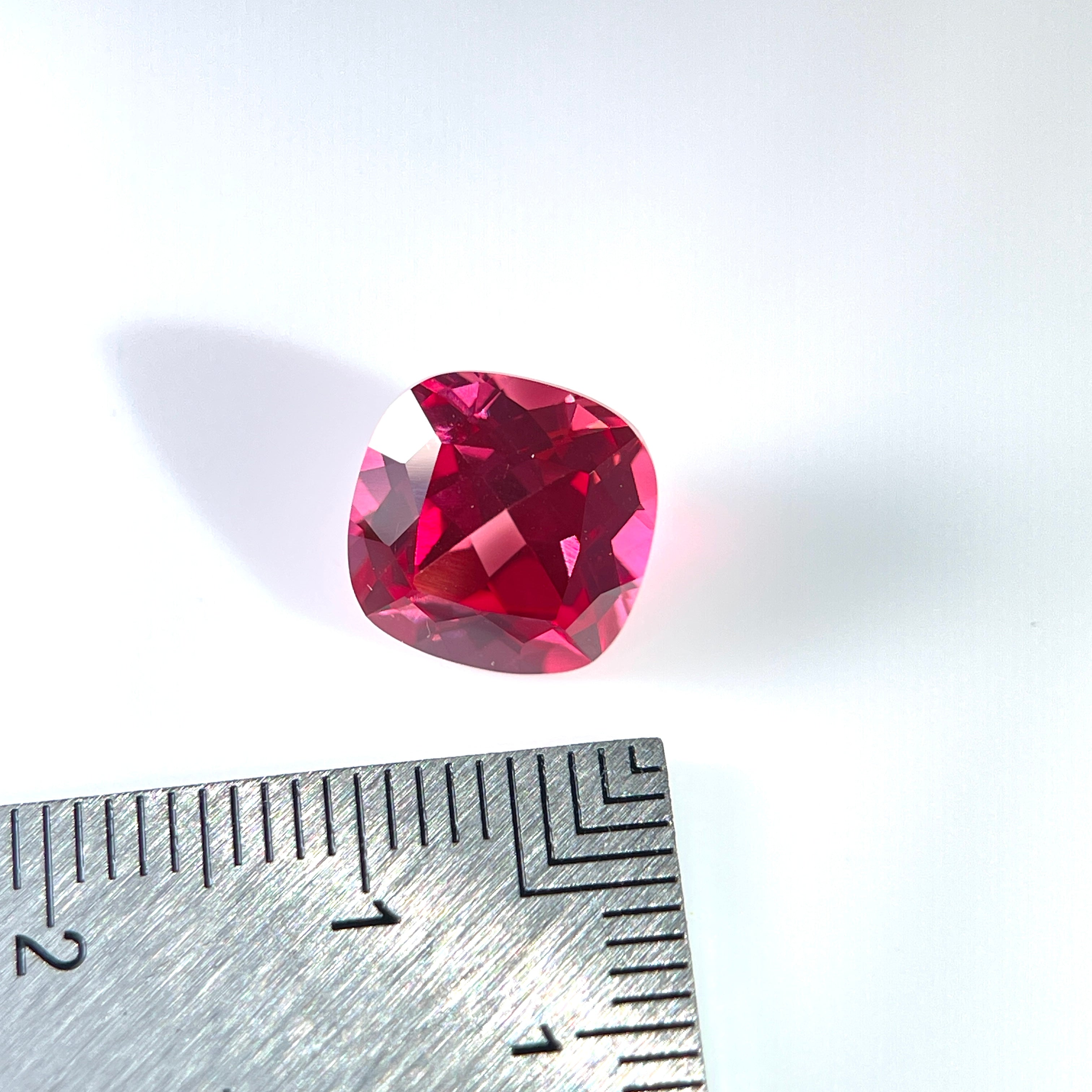 ~5ct Dark Padparadscha Sapphire | Cushion Cut | 10 × 10 mm | Gemdrop® Verified