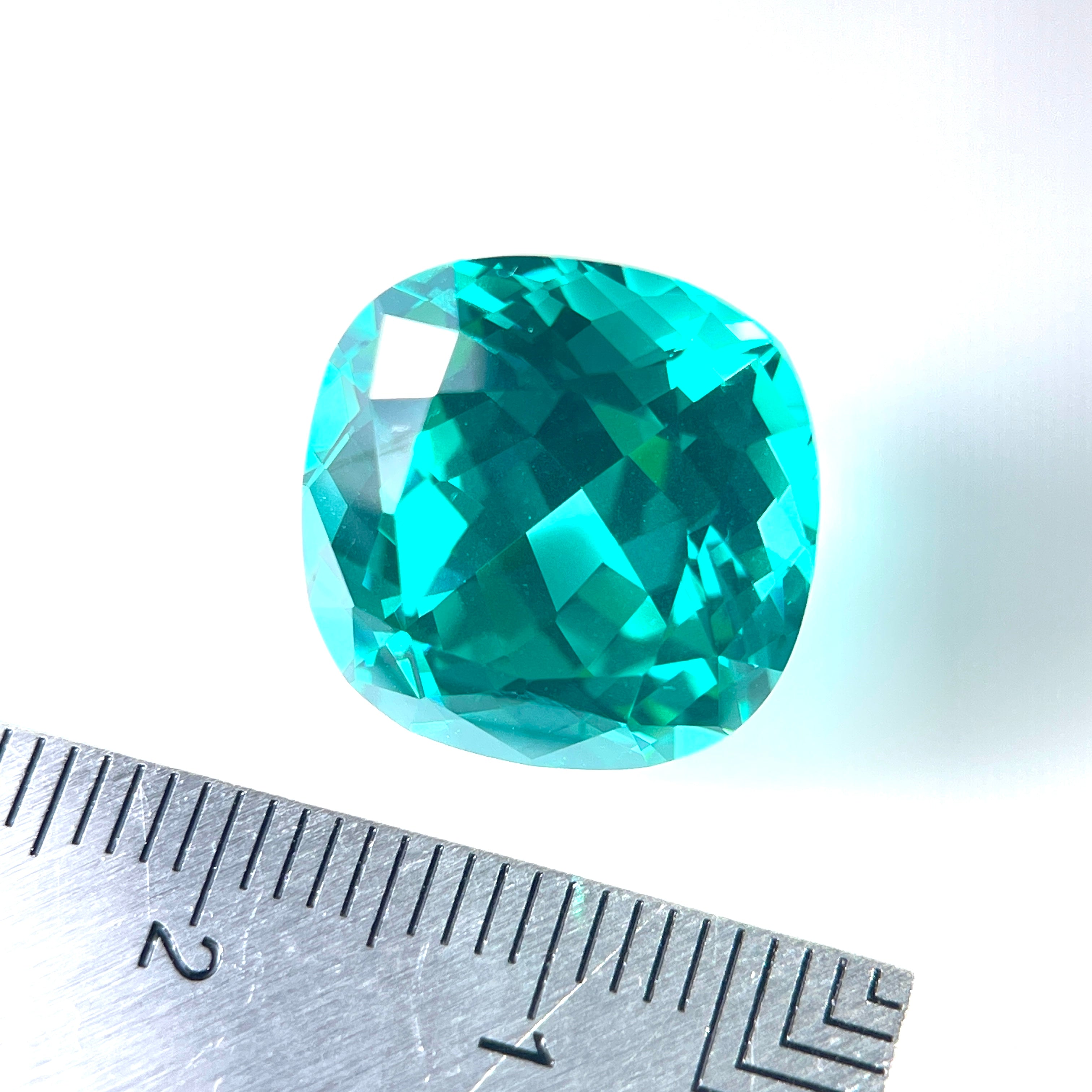 ~21ct Paraiba Sapphire | Cushion Cut | 15 × 15 mm | Gemdrop® Verified
