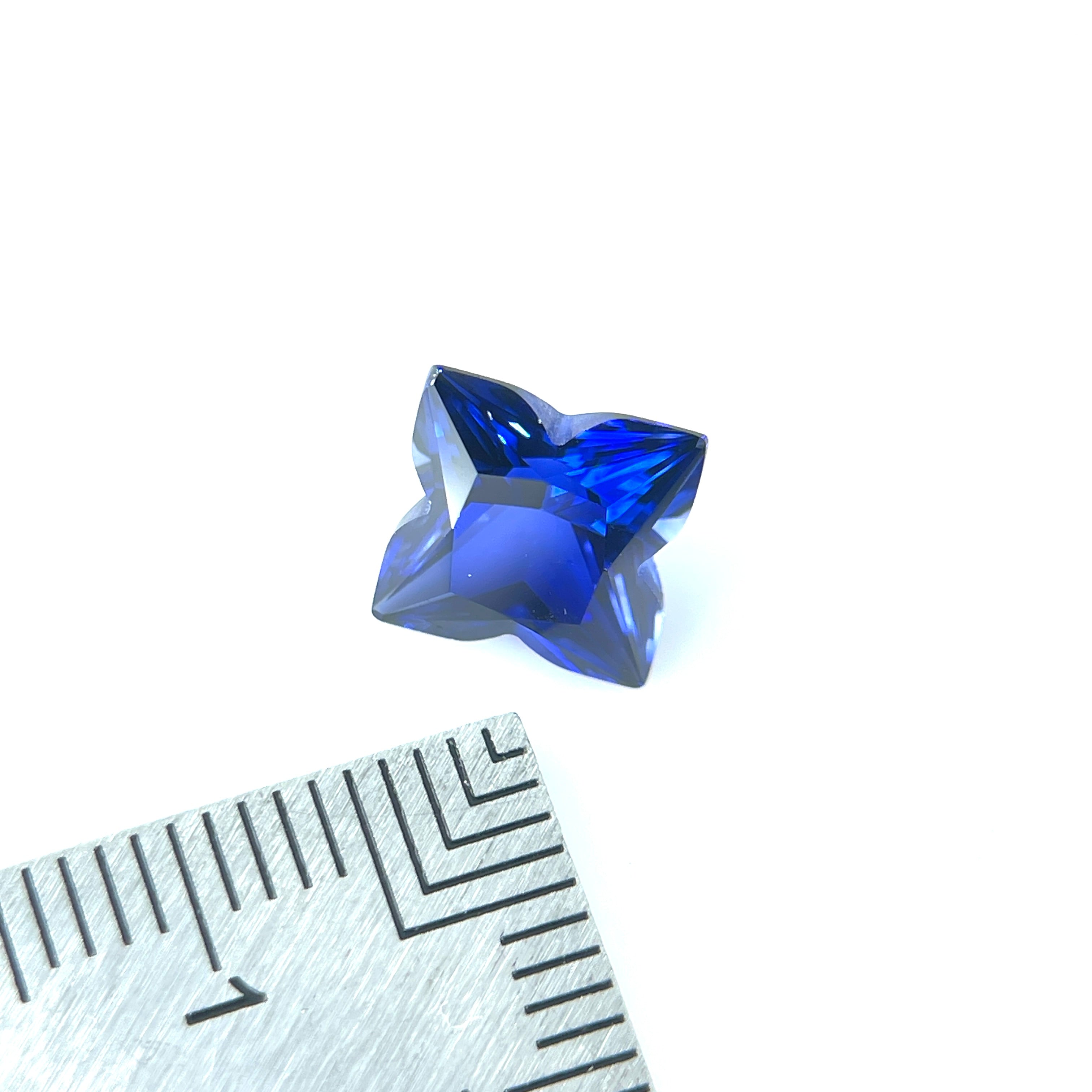 ~3ct Sapphire | Louis Vuitton Monogram Star Fantasy Cut | 8 × 8 mm | Multiple Colours | Gemdrop® Verified