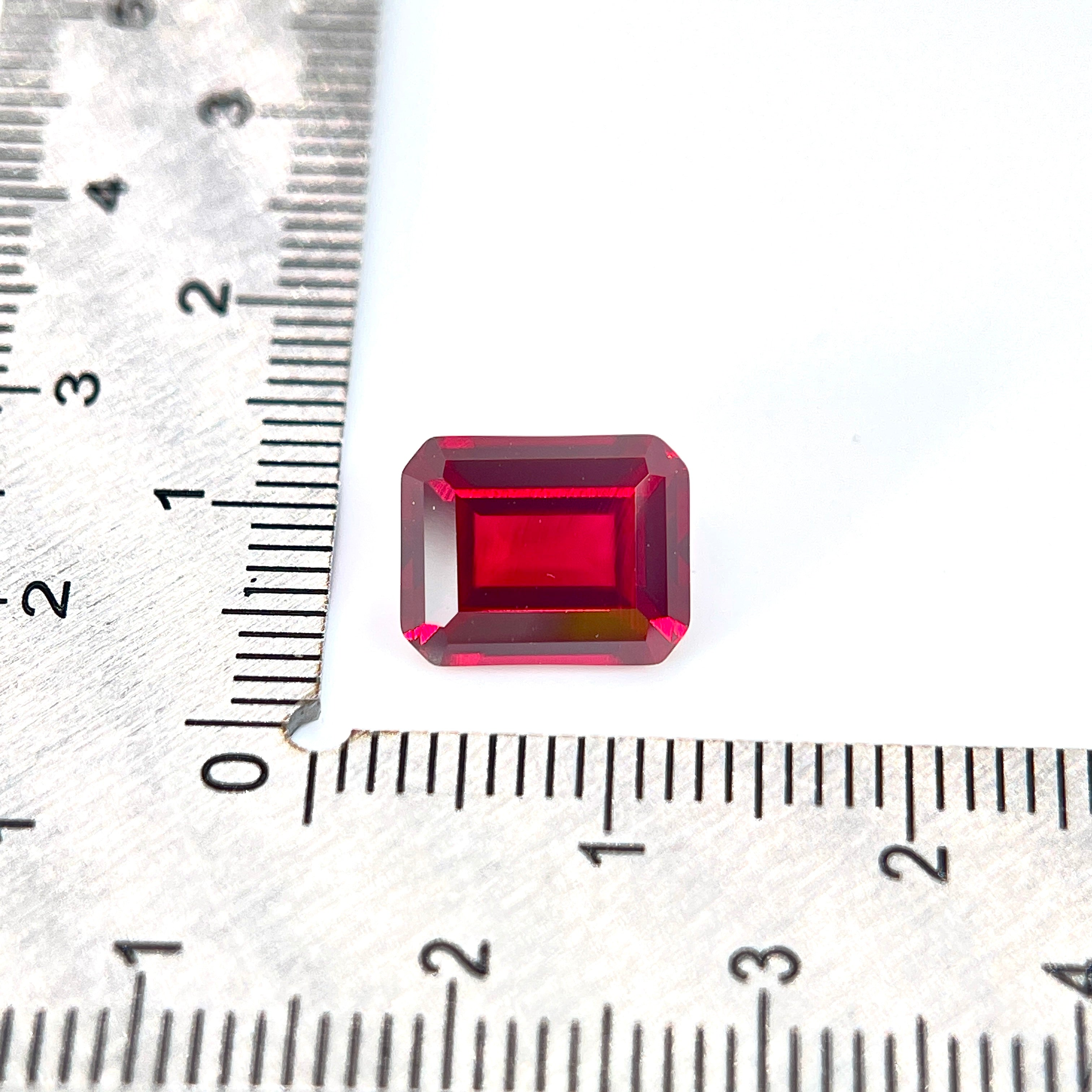 ~4ct Pigeon Blood Red Ruby | Emerald Cut | 8 × 10 mm | Gemdrop® Verified