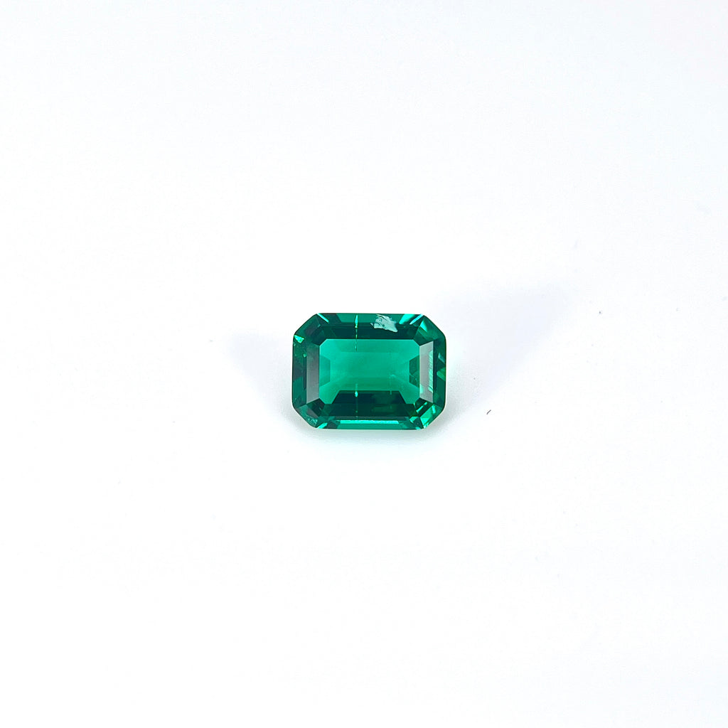 ~1.2ct Zambia Green Hydrothermal Emerald [Beryl] | Emerald Cut | 6 × 8 mm | Feather Inclusions | Gemdrop® Verified
