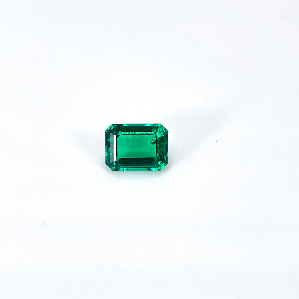 ~1.2ct Zambia Green Hydrothermal Emerald [Beryl] | Emerald Cut | 6 × 8 mm | Feather Inclusions | Gemdrop® Verified