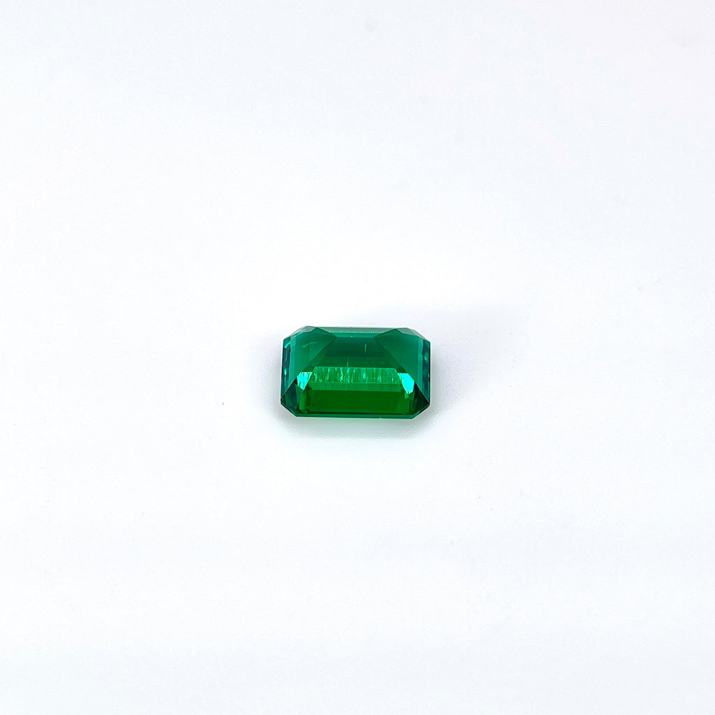 ~1.2ct Zambia Green Hydrothermal Emerald [Beryl] | Emerald Cut | 6 × 8 mm | Feather Inclusions | Gemdrop® Verified