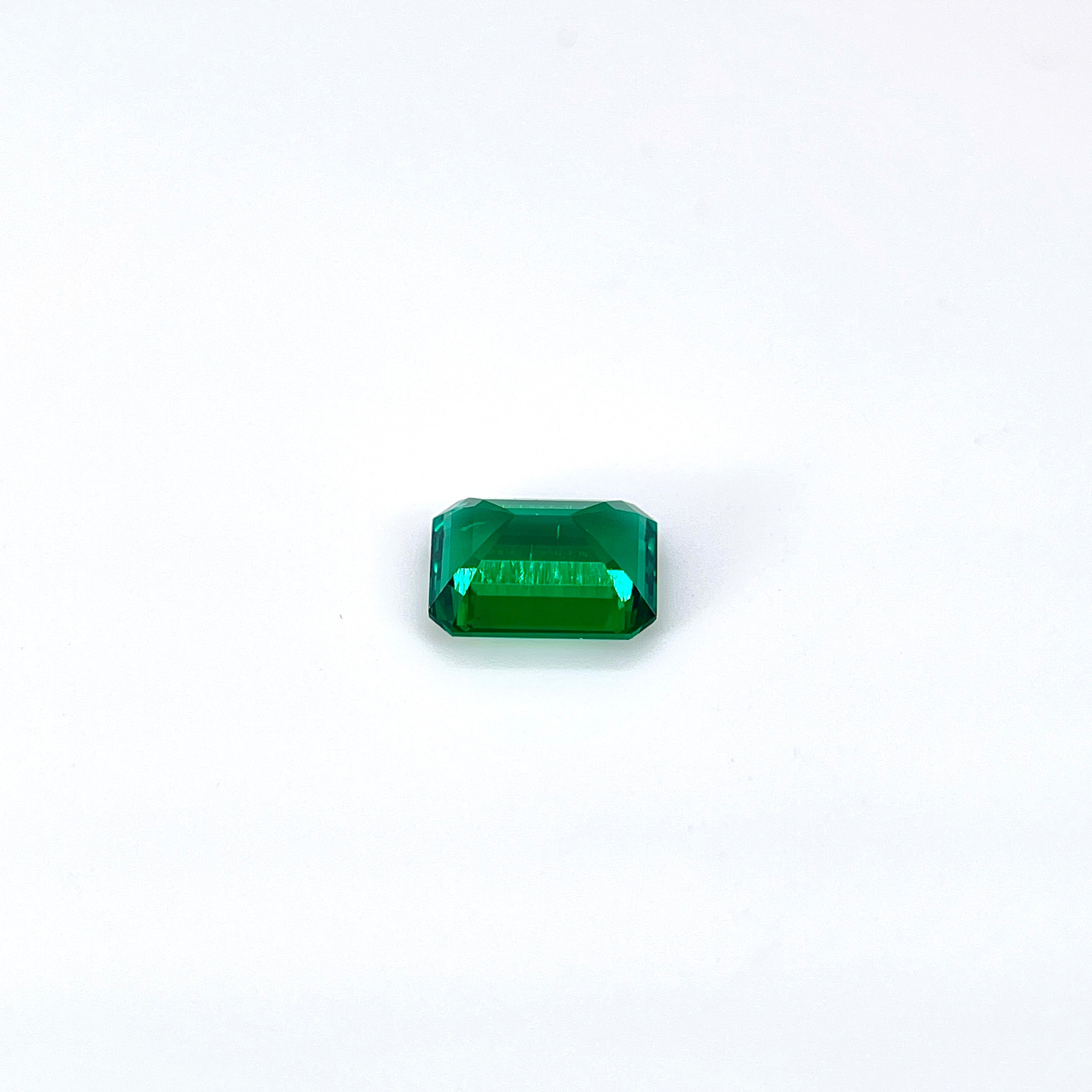 ~1.2ct Zambia Green Hydrothermal Emerald [Beryl] | Emerald Cut | 6 × 8 mm | Feather Inclusions | Gemdrop® Verified