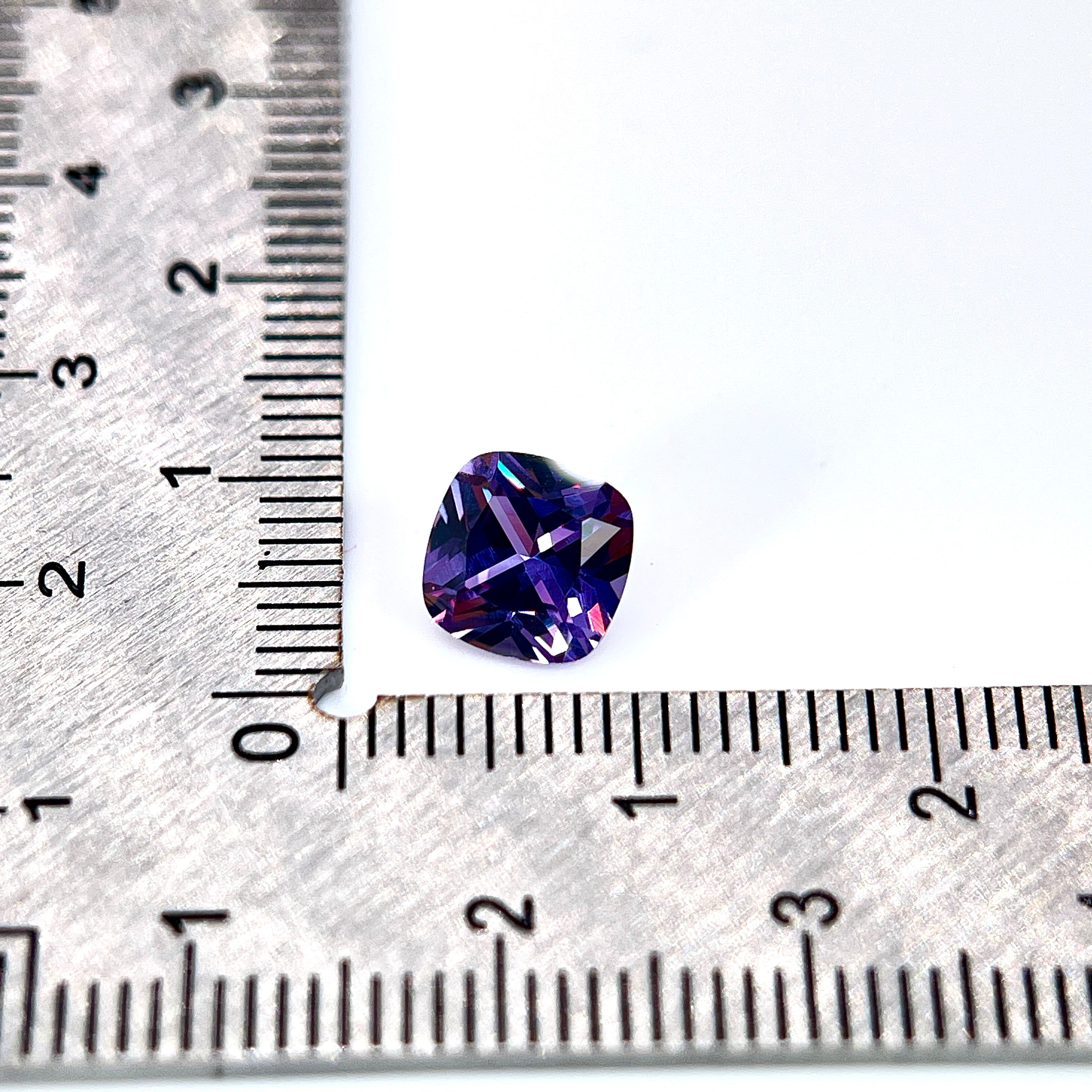 ~1.8ct Purple–Green Colour Change Corundum Alexandrite | Cushion Cut | 7 × 7 mm | Gemdrop® Verified