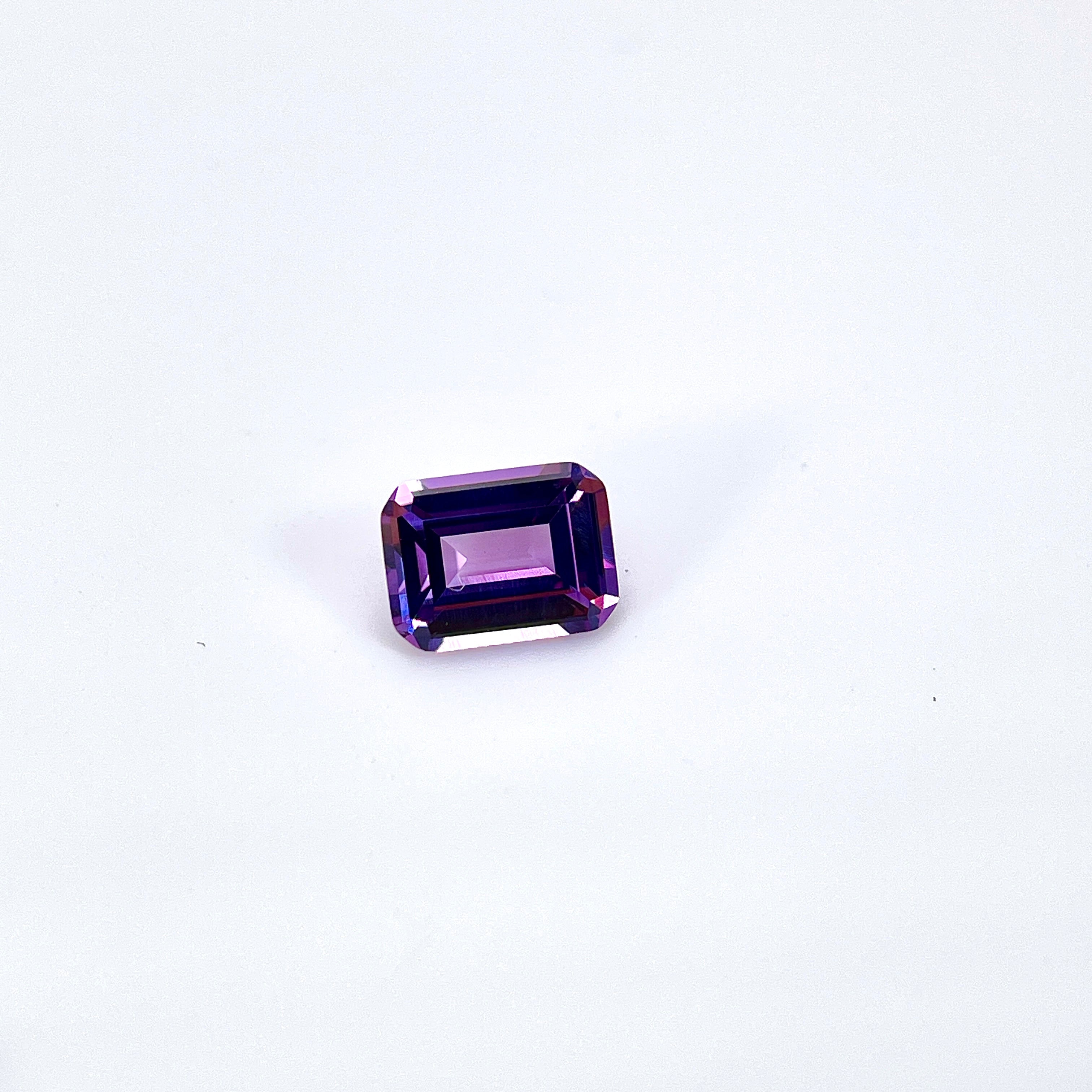 ~1.9ct Purple–Green Colour Change Corundum Alexandrite | Emerald Cut | 6 × 8 mm | Gemdrop® Verified