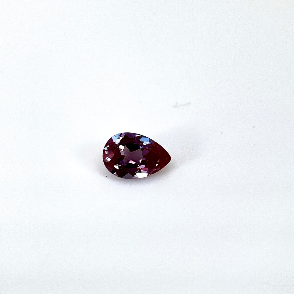~1.54ct Purple–Green Colour Change Alexandrite [chrysoberyl] | Drop Cut | 6 × 9 mm | Gemdrop® Verified