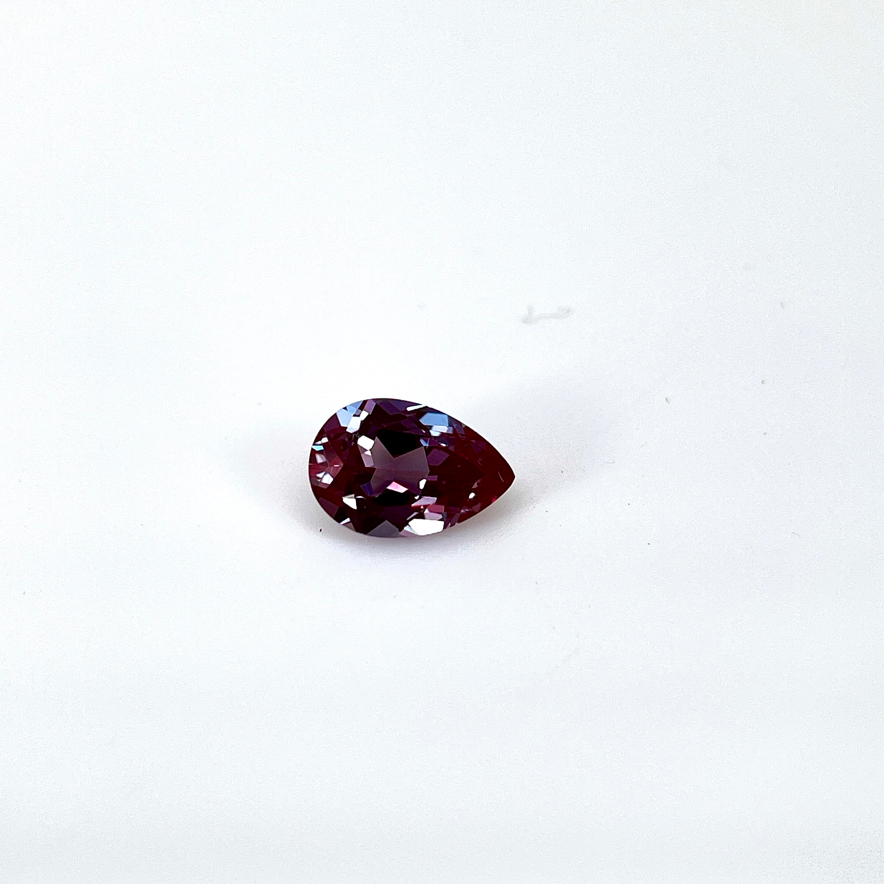 ~1.54ct Purple–Green Colour Change Alexandrite [chrysoberyl] | Drop Cut | 6 × 9 mm | Gemdrop® Verified