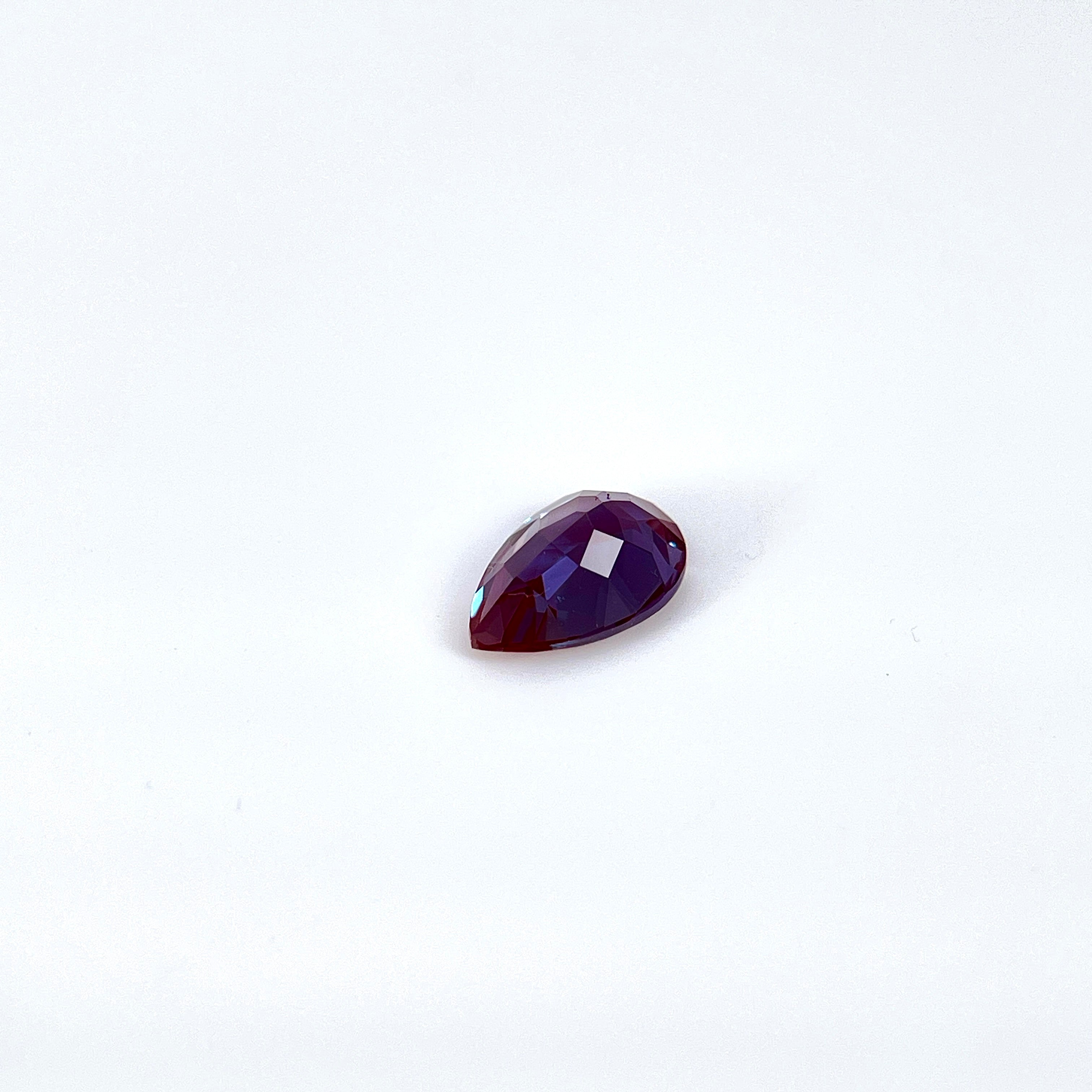 ~1.54ct Purple–Green Colour Change Alexandrite [chrysoberyl] | Drop Cut | 6 × 9 mm | Gemdrop® Verified