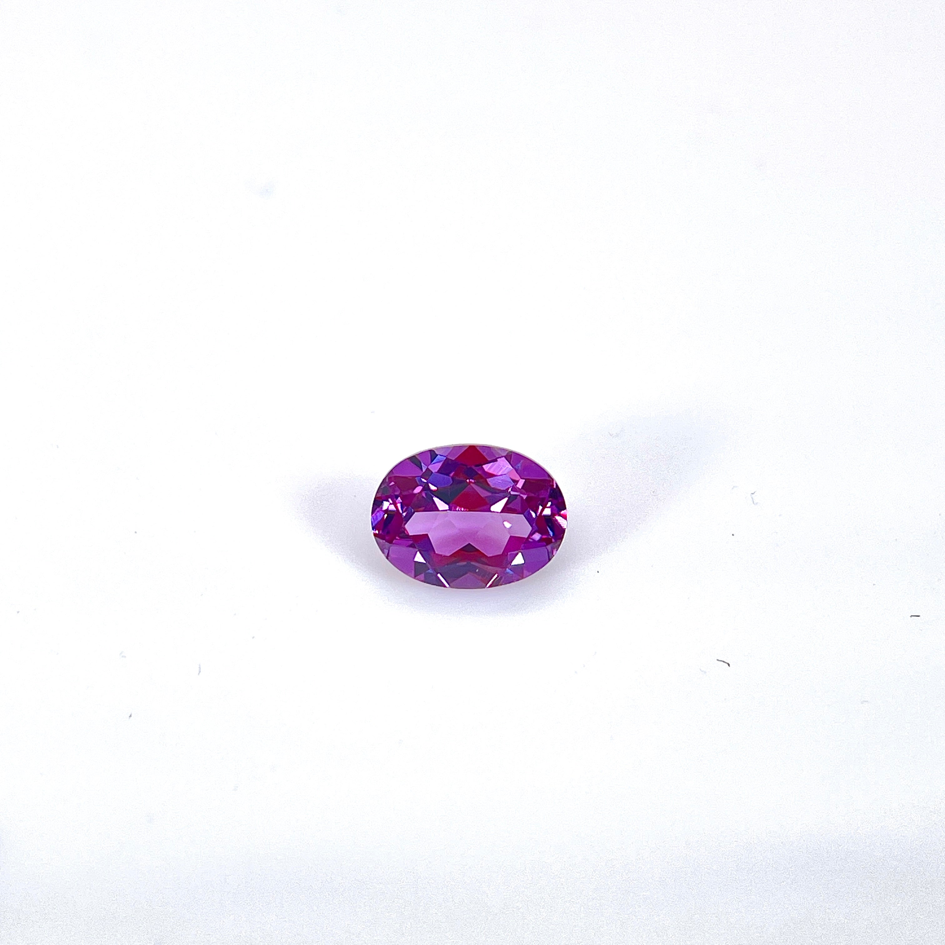 ~1.65ct Purple–Green Colour Change Corundum Alexandrite | Oval Cut | 6 × 8 mm | Gemdrop® Verified