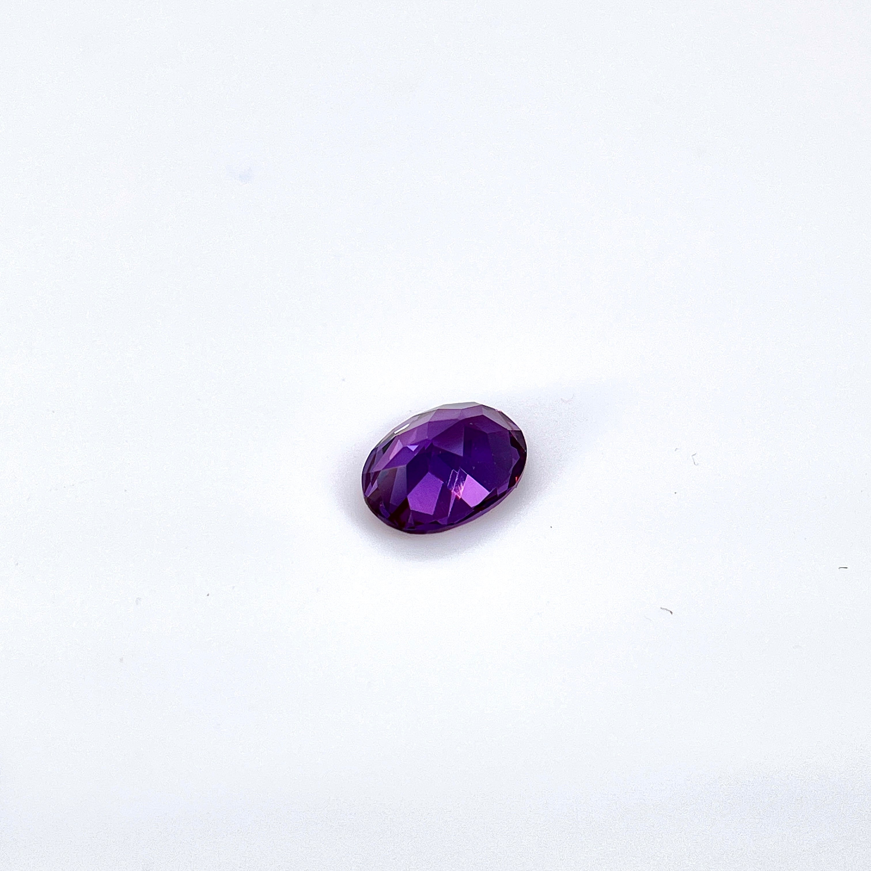 ~1.65ct Purple–Green Colour Change Corundum Alexandrite | Oval Cut | 6 × 8 mm | Gemdrop® Verified