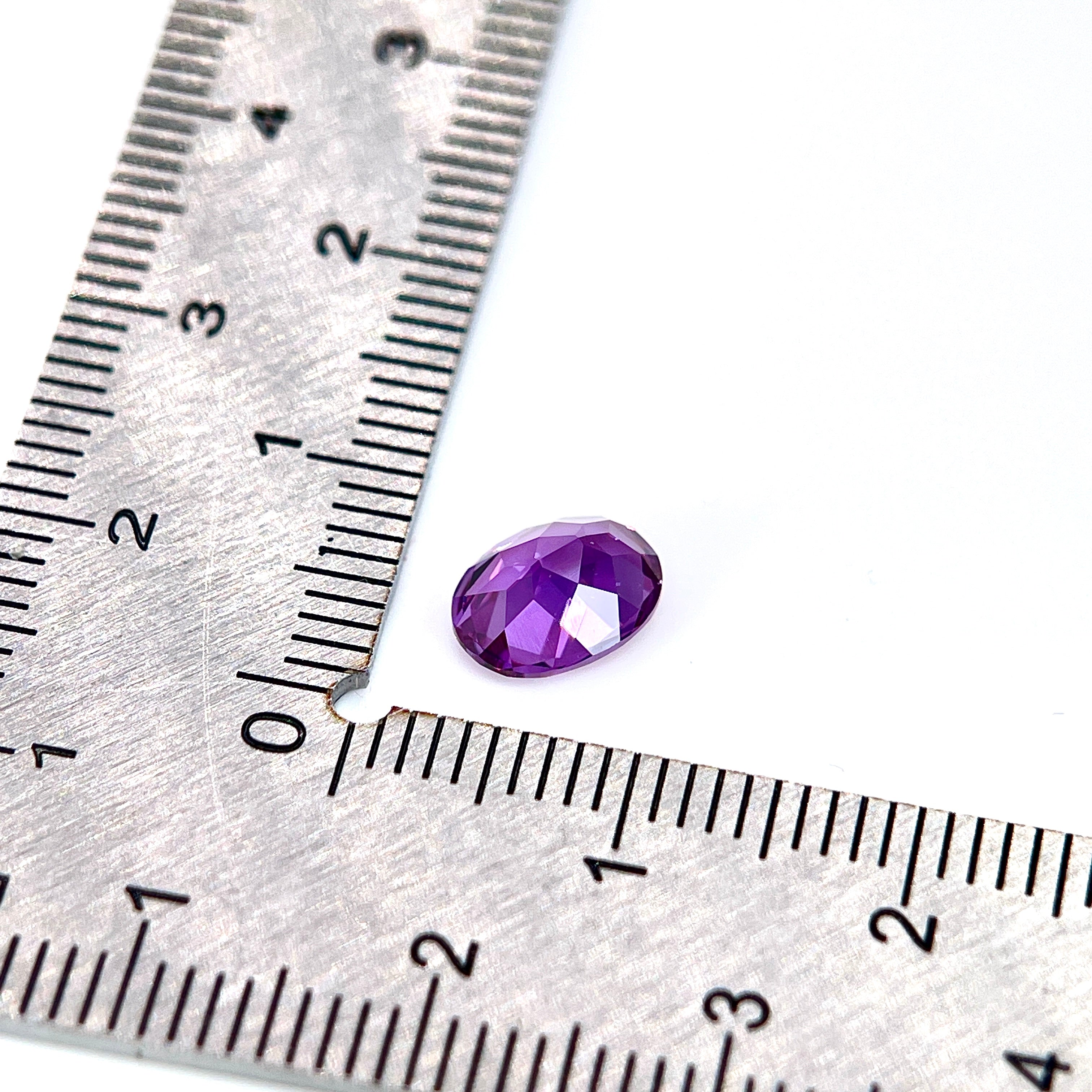 ~1.65ct Purple–Green Colour Change Corundum Alexandrite | Oval Cut | 6 × 8 mm | Gemdrop® Verified