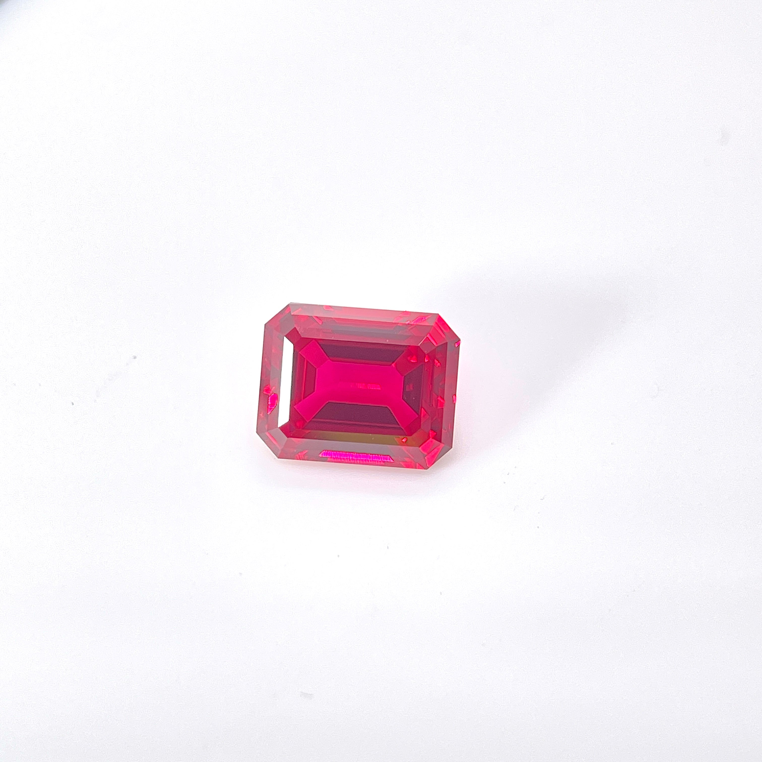 ~4.19ct Pigeon Blood Red Czochralski Sapphire | Emerald Cut | 8 × 10 mm | Gemdrop® Verified