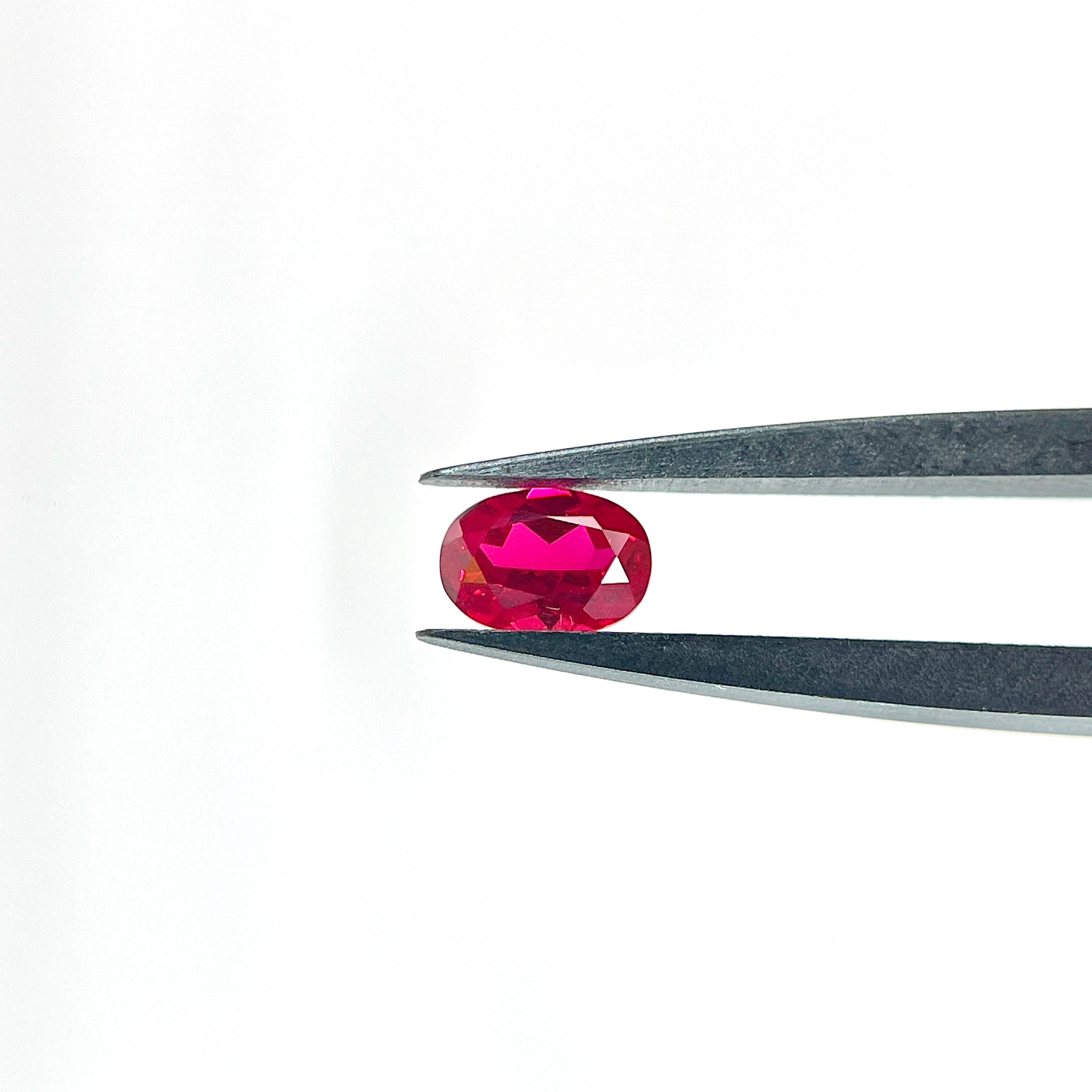 ~0.9ct Pigeon Blood Red Czochralski Ruby | Oval Cut | 5 × 7 mm | Gemdrop® Verified