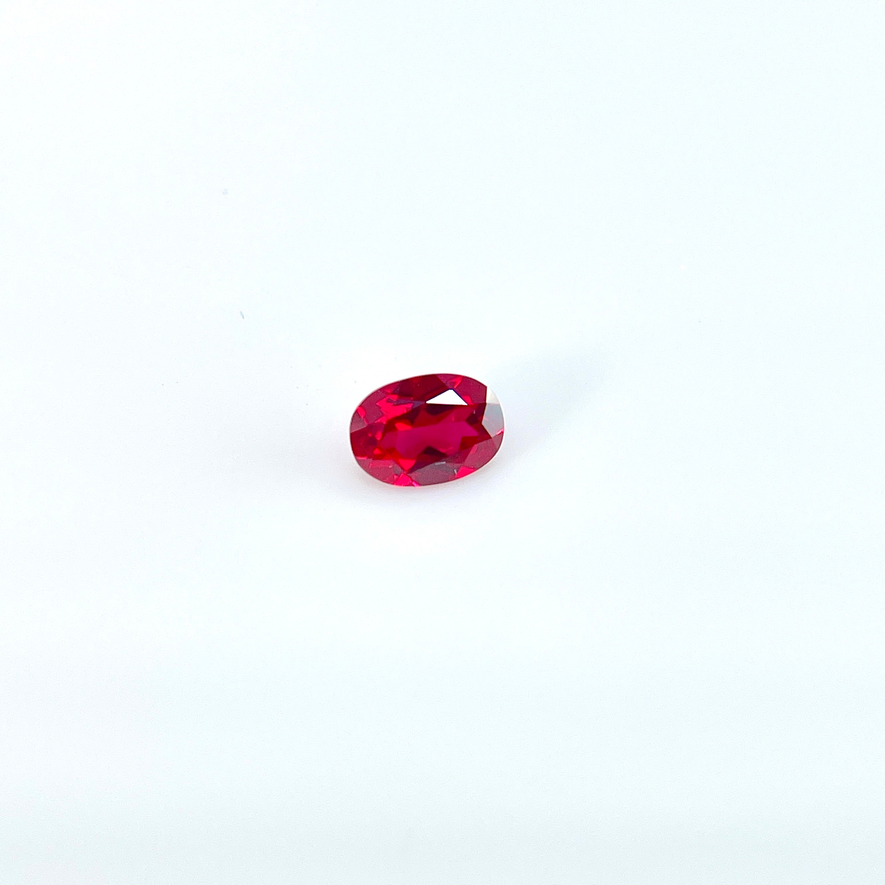 ~0.9ct Pigeon Blood Red Czochralski Ruby | Oval Cut | 5 × 7 mm | Gemdrop® Verified