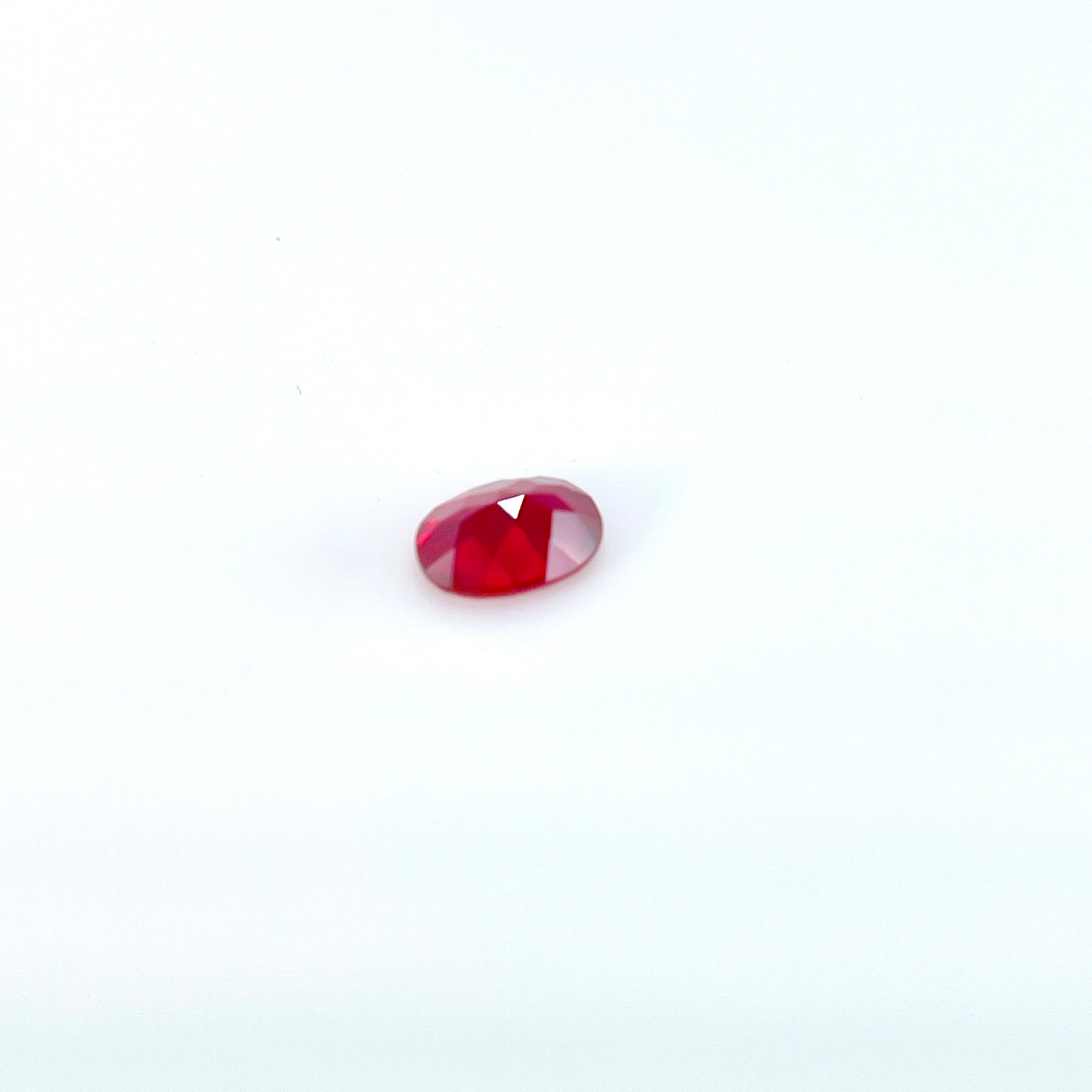 ~0.9ct Pigeon Blood Red Czochralski Ruby | Oval Cut | 5 × 7 mm | Gemdrop® Verified