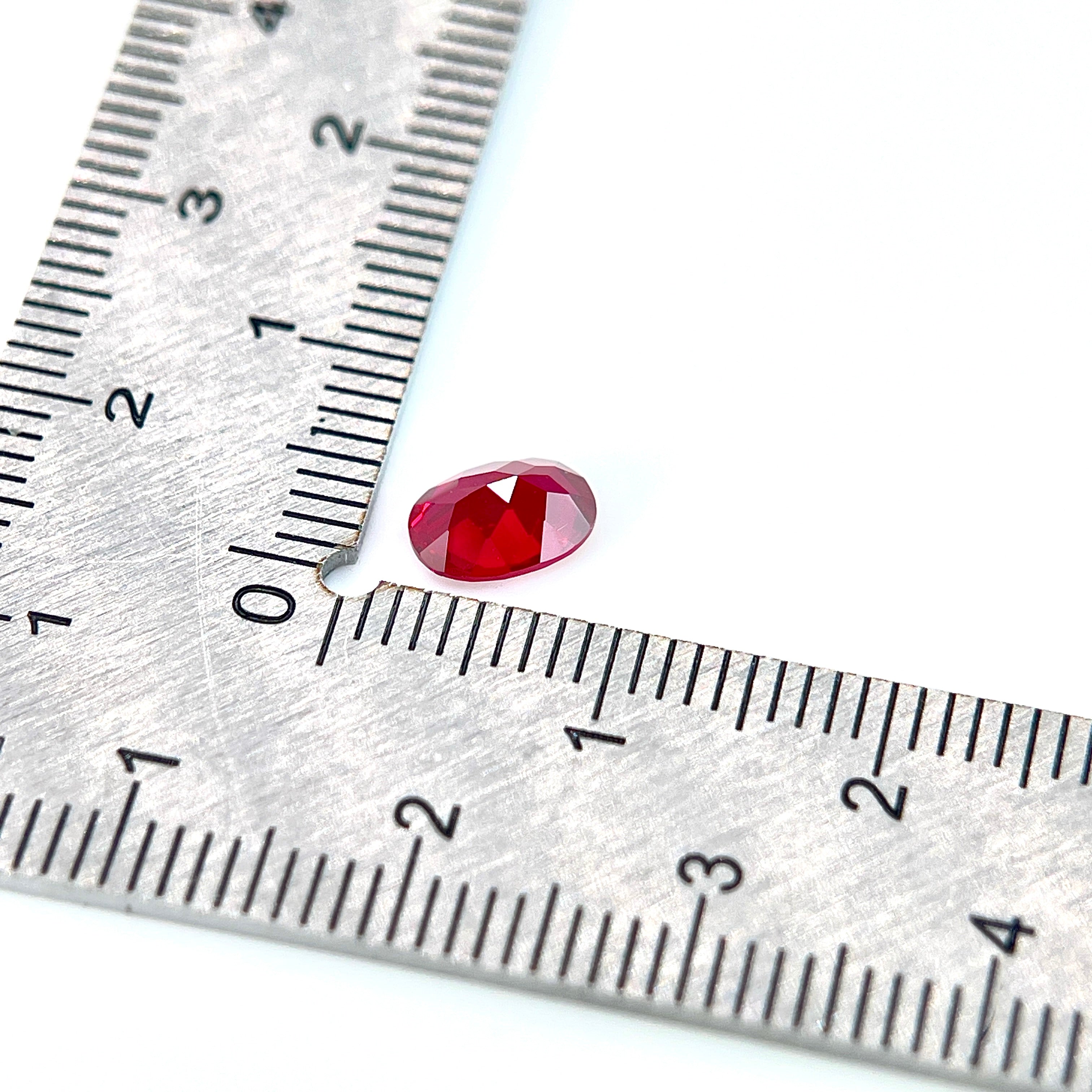 ~0.9ct Pigeon Blood Red Czochralski Ruby | Oval Cut | 5 × 7 mm | Gemdrop® Verified