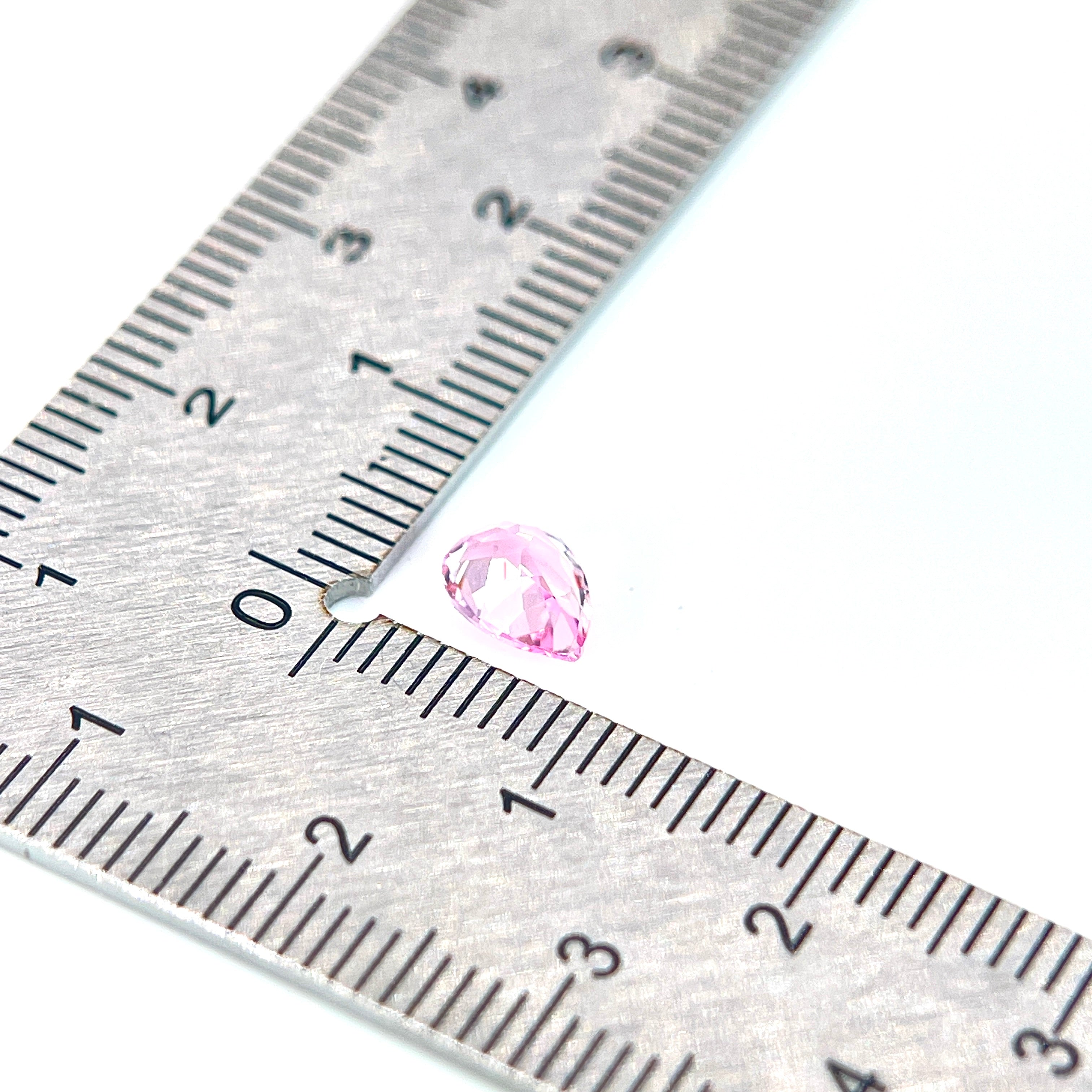 ~0.8ct Padparadscha Czochralski Sapphire | Drop Cut | 5 × 7 mm | Gemdrop® Verified